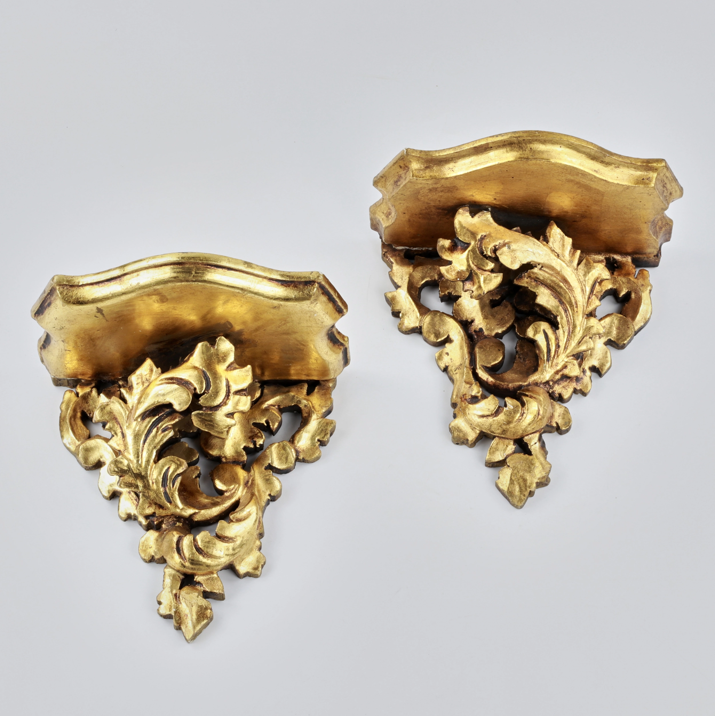 Pair of carved consoles