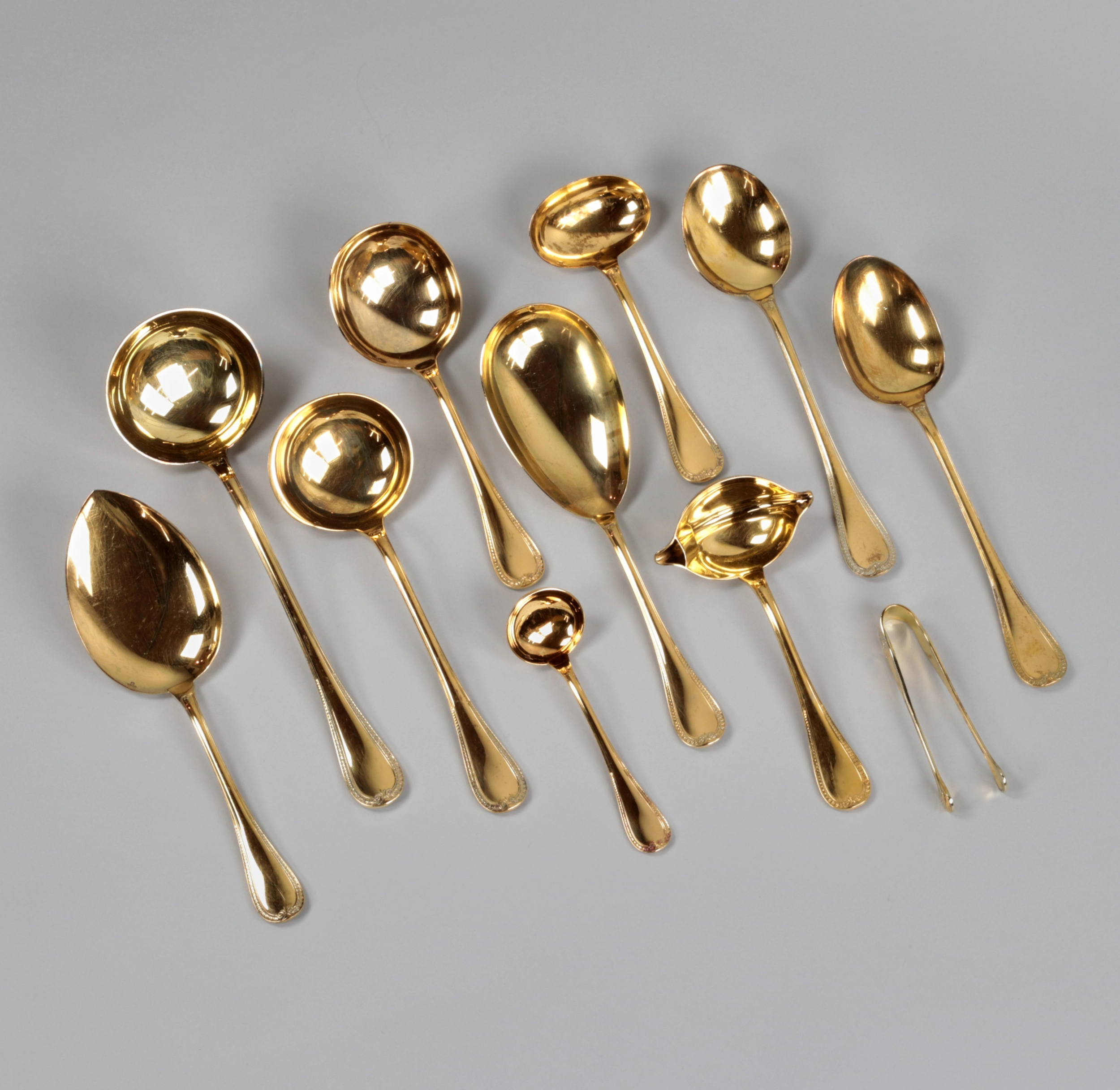 Gilded tableware set from Christofle.
