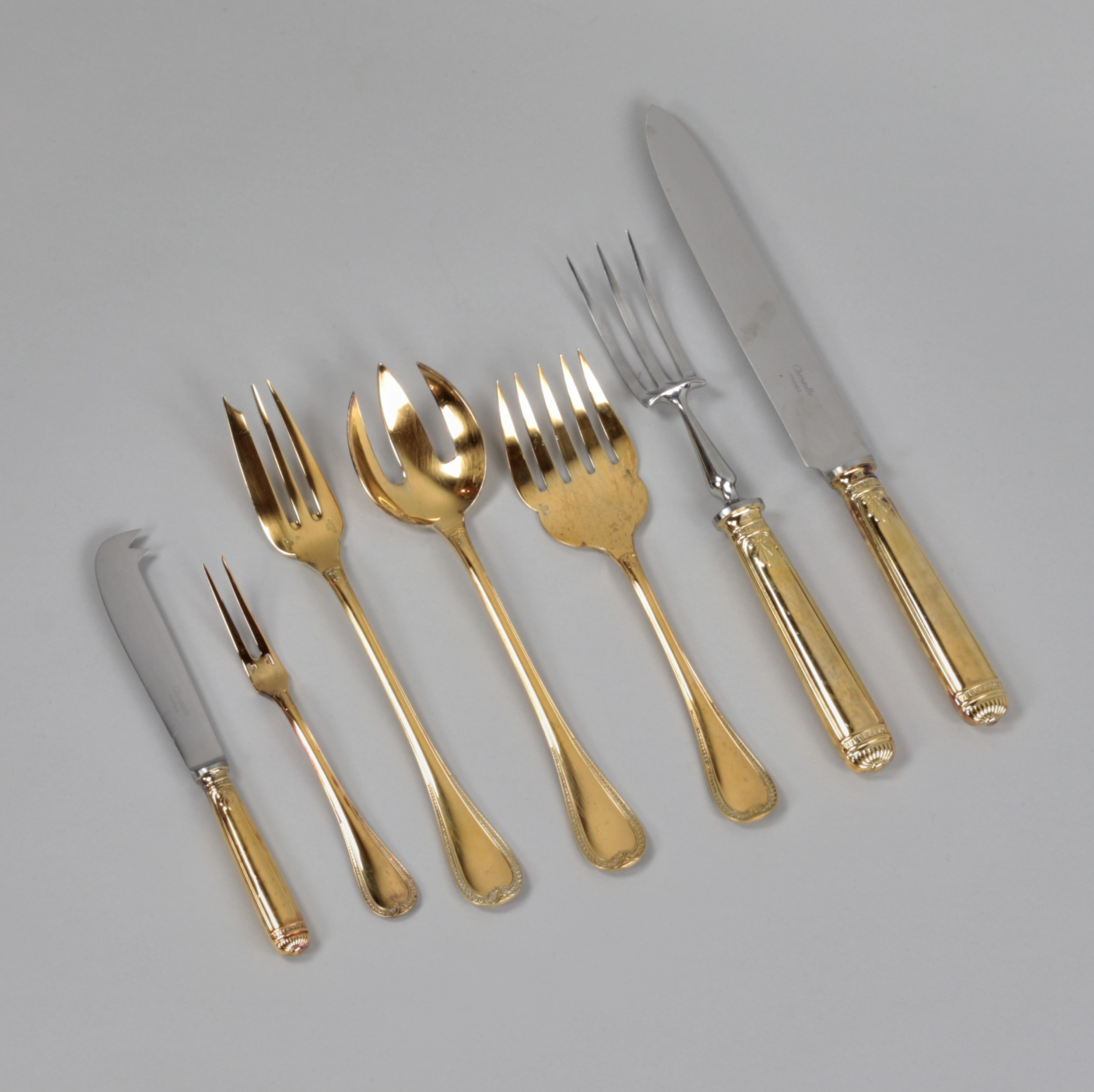 Gilded tableware set from Christofle.