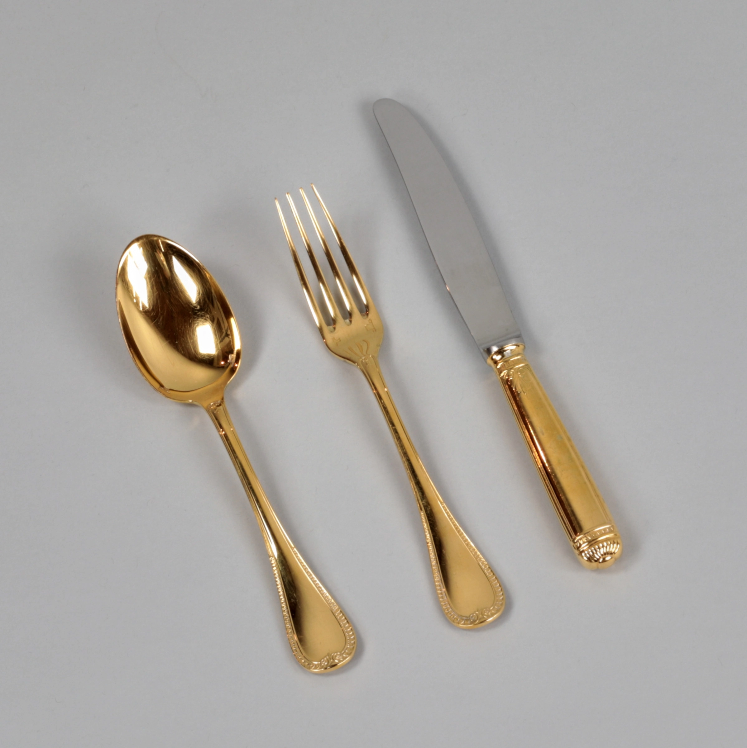 Gilded tableware set from Christofle.