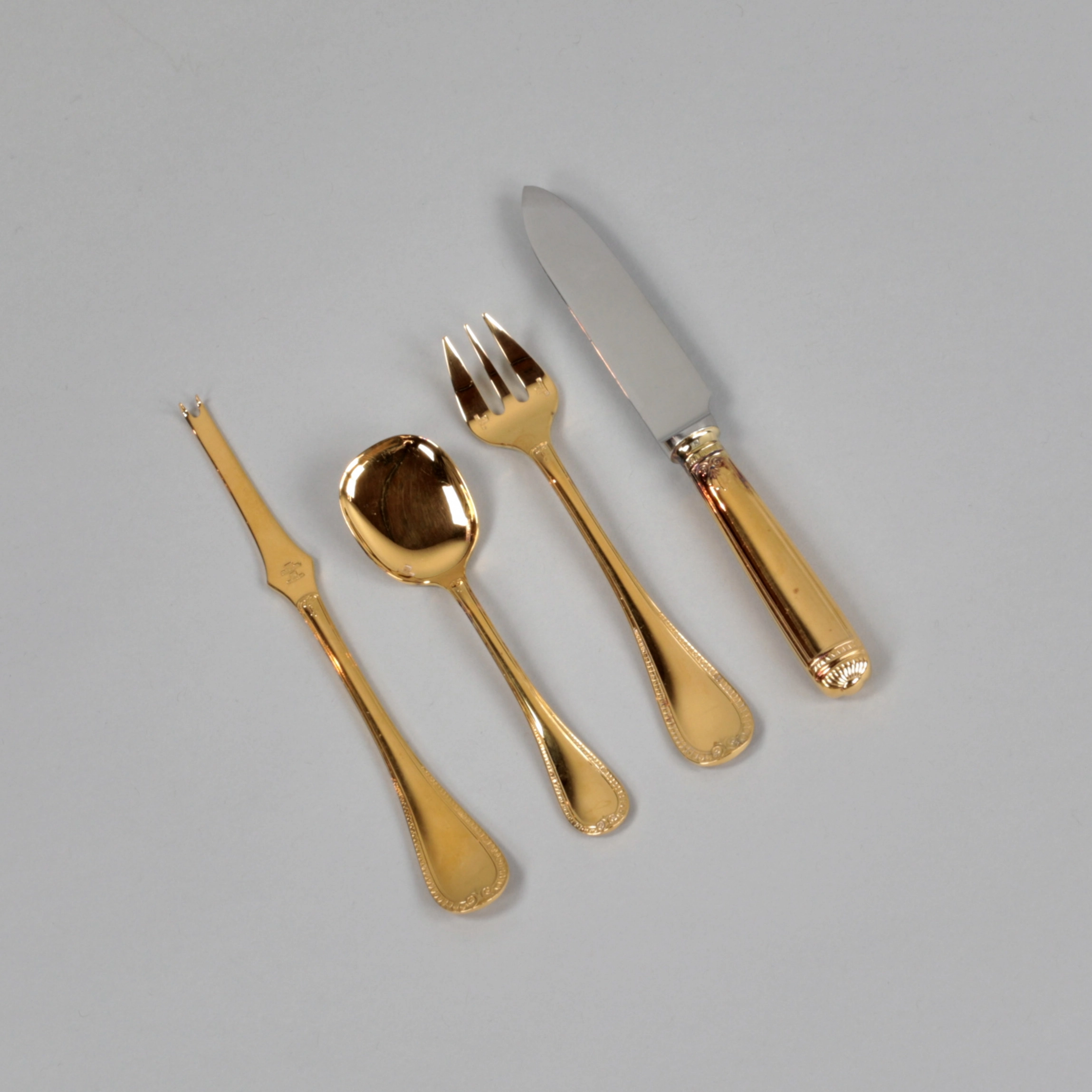 Gilded tableware set from Christofle.