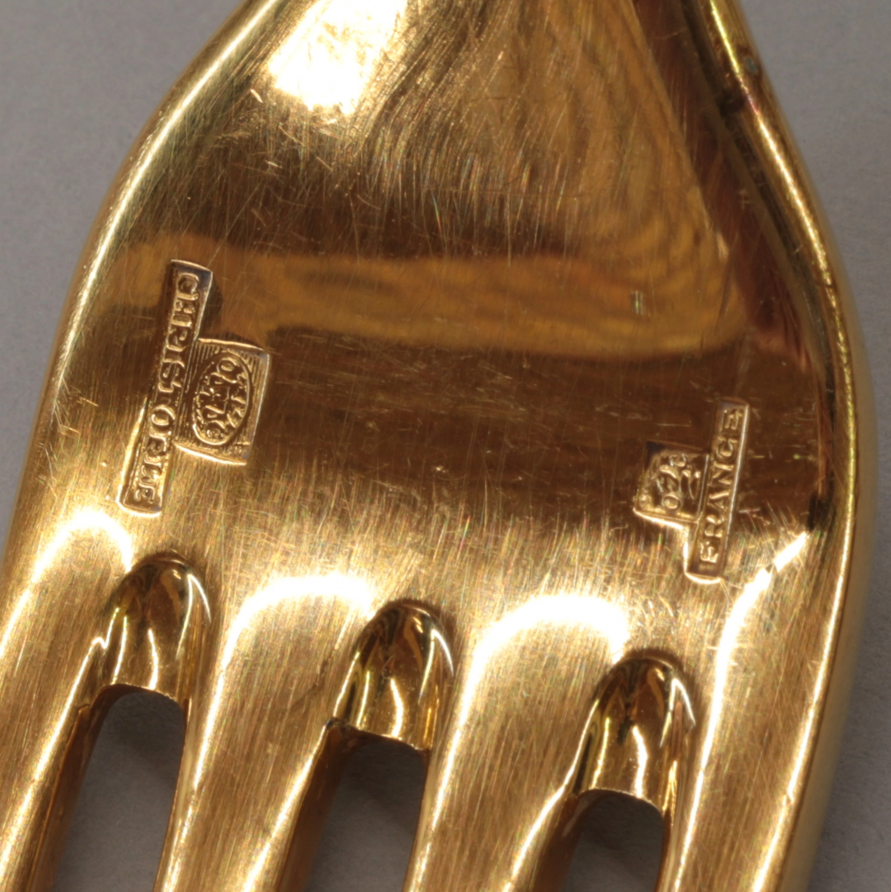 Gilded tableware set from Christofle.