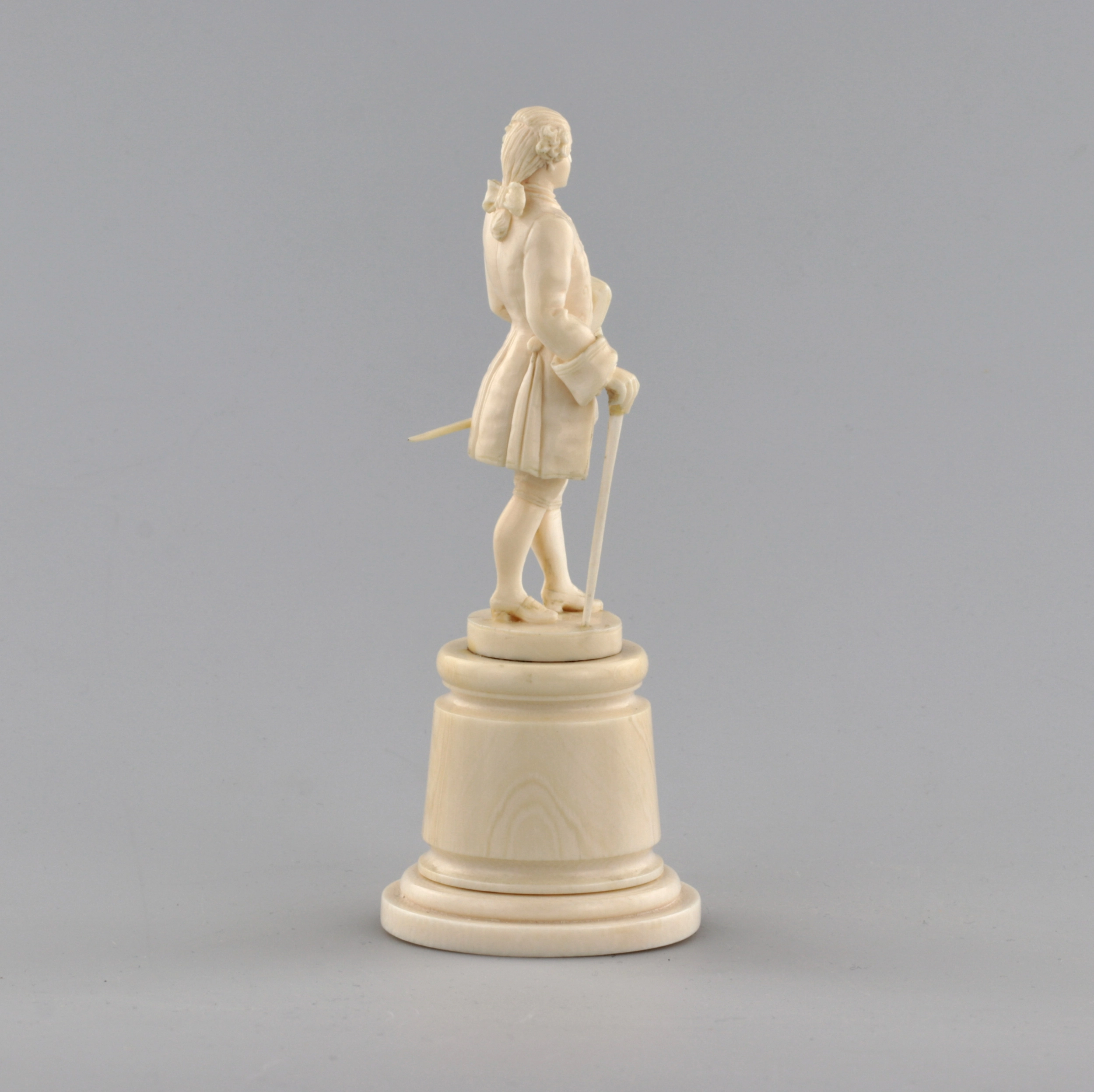 Ivory figure of a gentleman in a cocked hat.