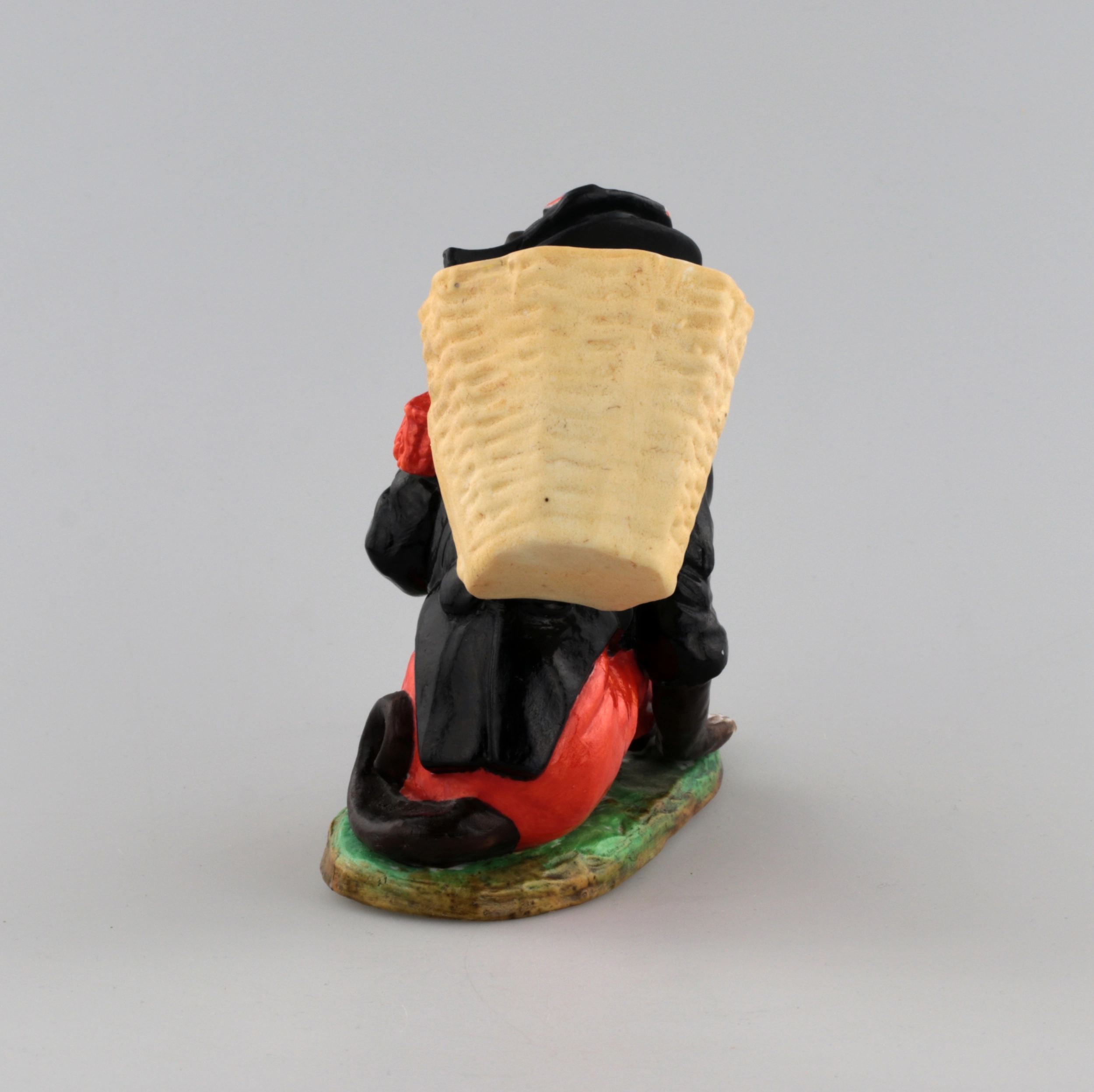 PORCELAIN FIGURE-CONTAINER MONKEY AS NAPOLEON. THURINGIA, GERMANY. LATE 19TH TO EARLY 20TH CENTURY.