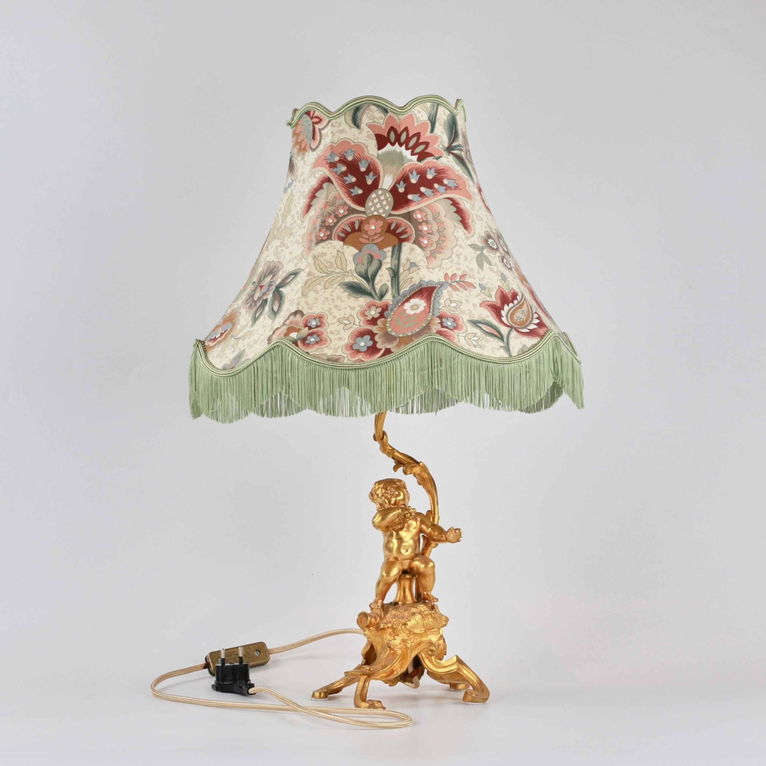 Pair of Putti table lamps 