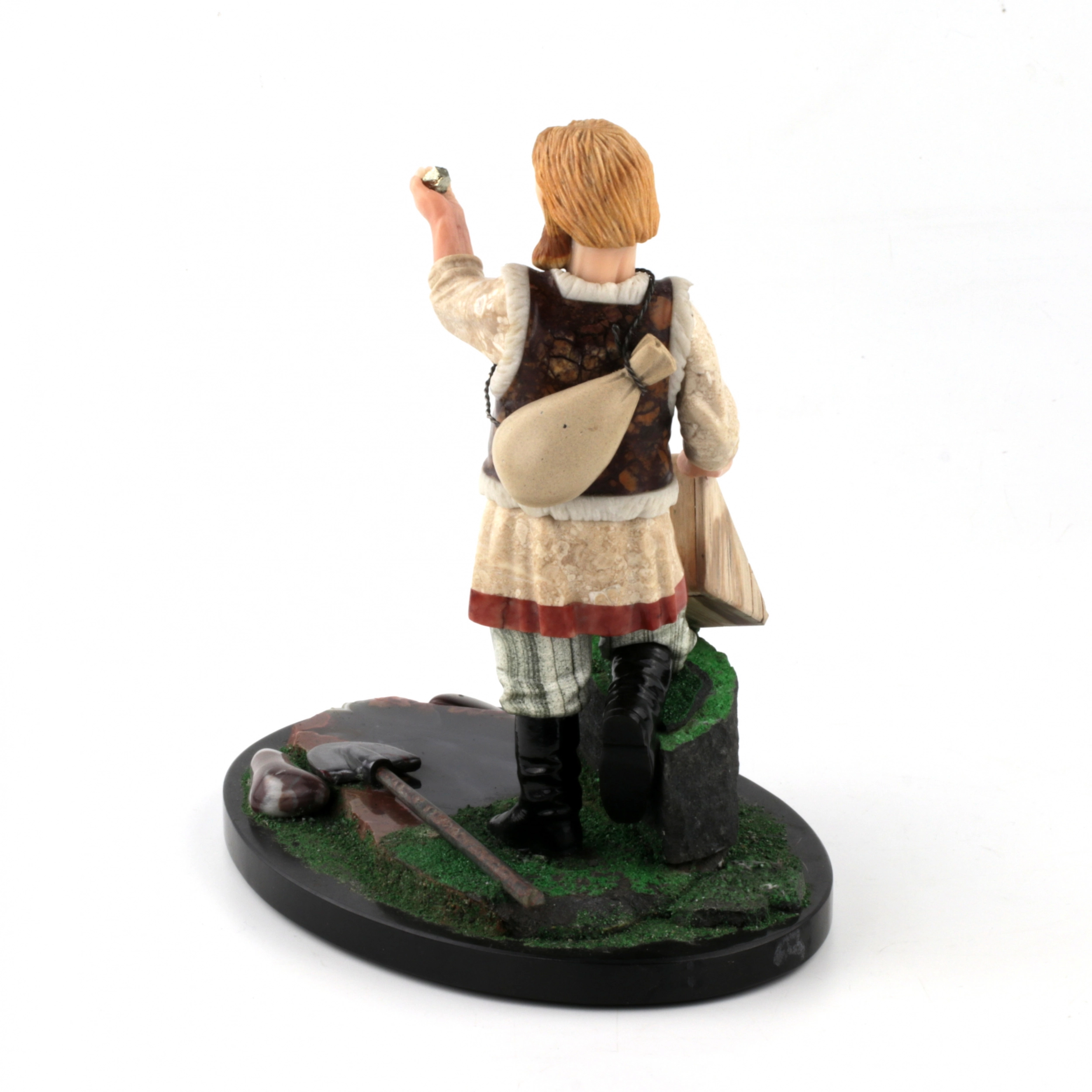 Figurine taillee dans la pierre Prospecteur.