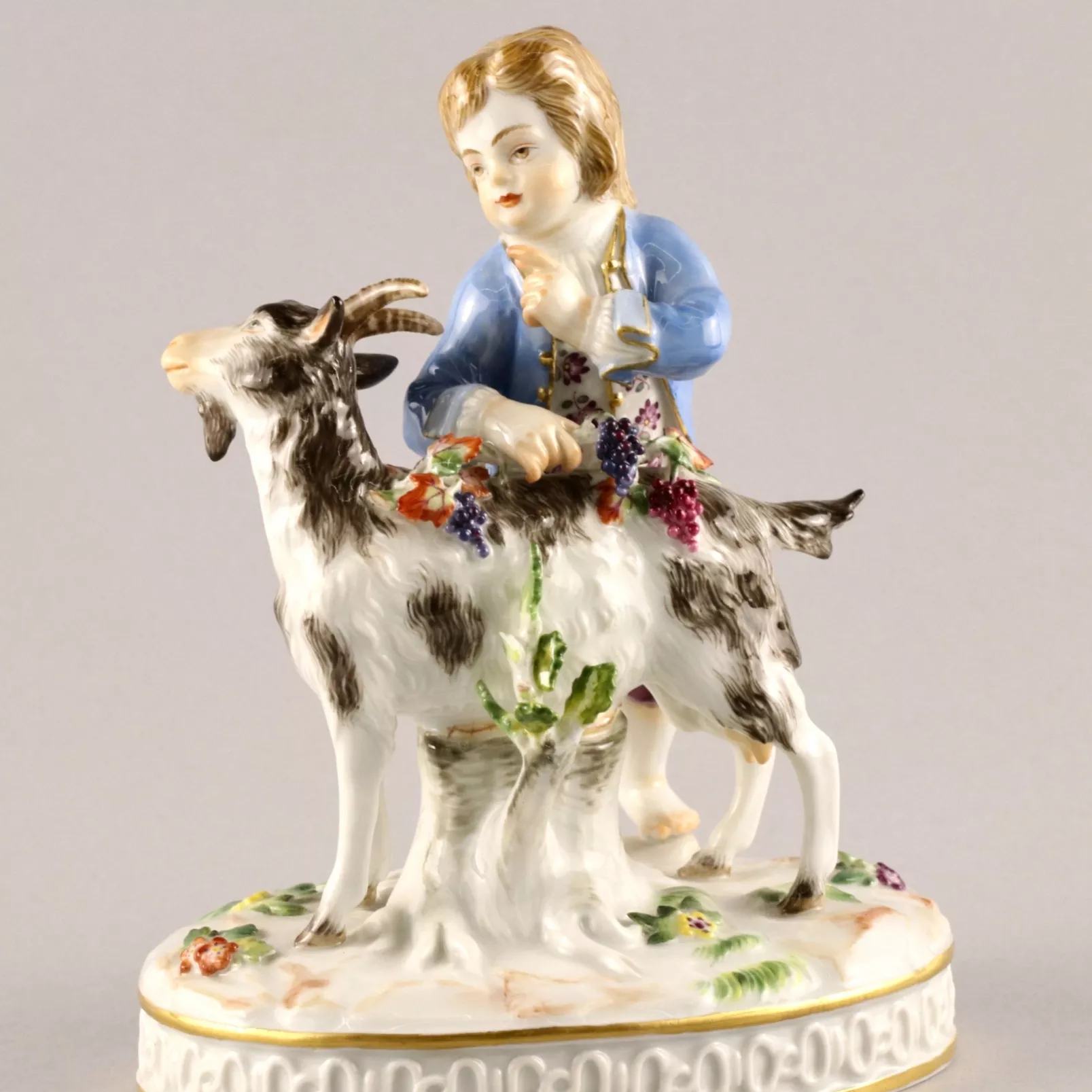 MEISSEN PORCELAIN FIGURE BOY WITH A GOAT. ALLEGORY OF AUTUMN
