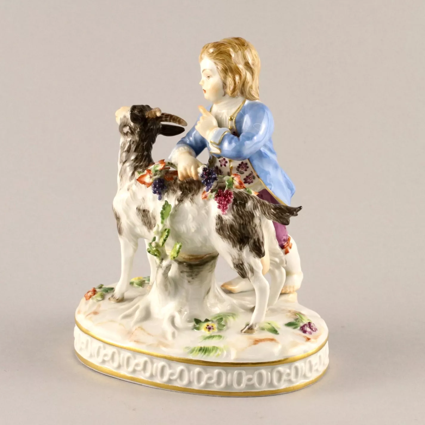 MEISSEN PORCELAIN FIGURE BOY WITH A GOAT. ALLEGORY OF AUTUMN
