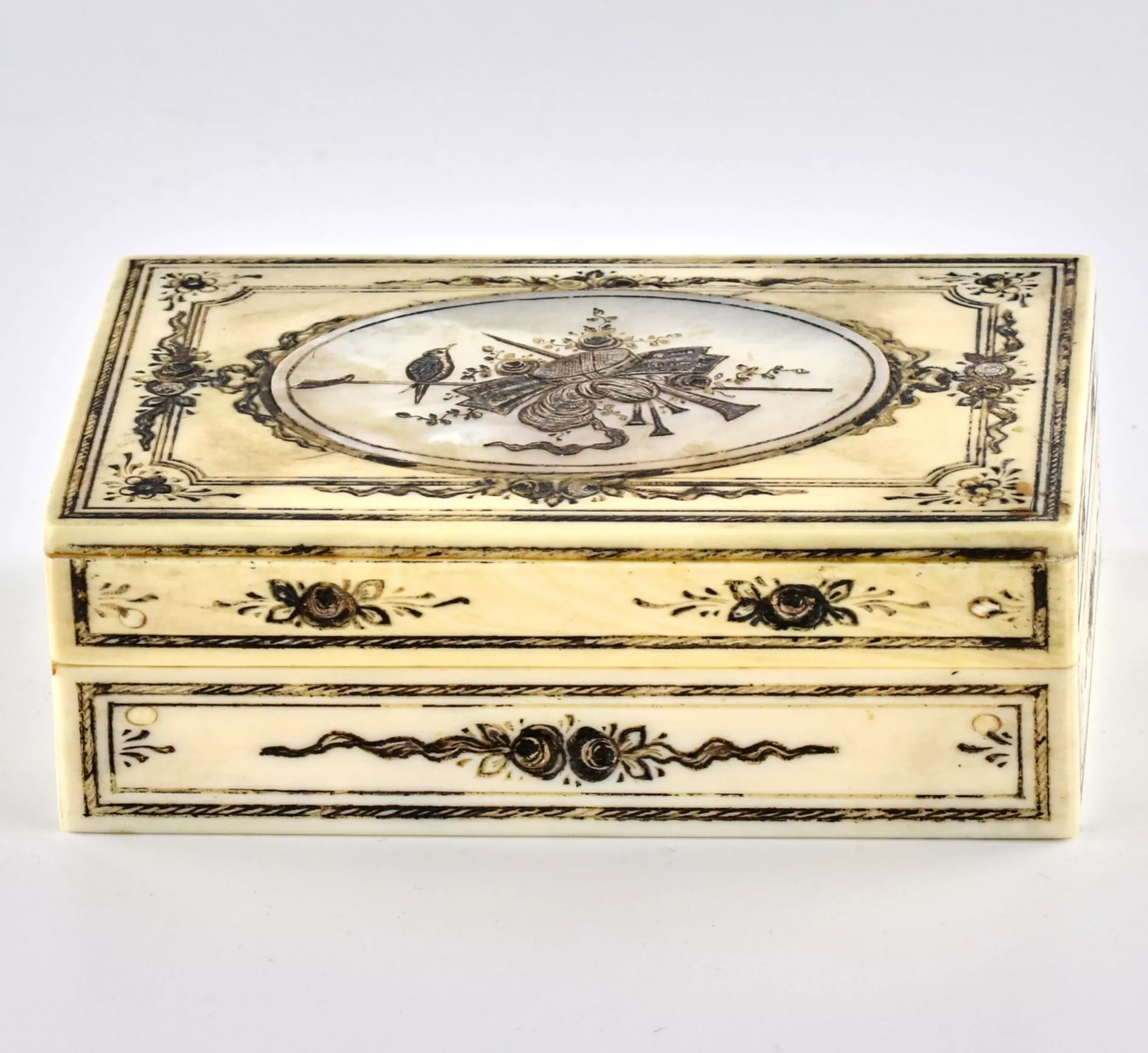 Ivory box with mother-of-pearl inlay. 