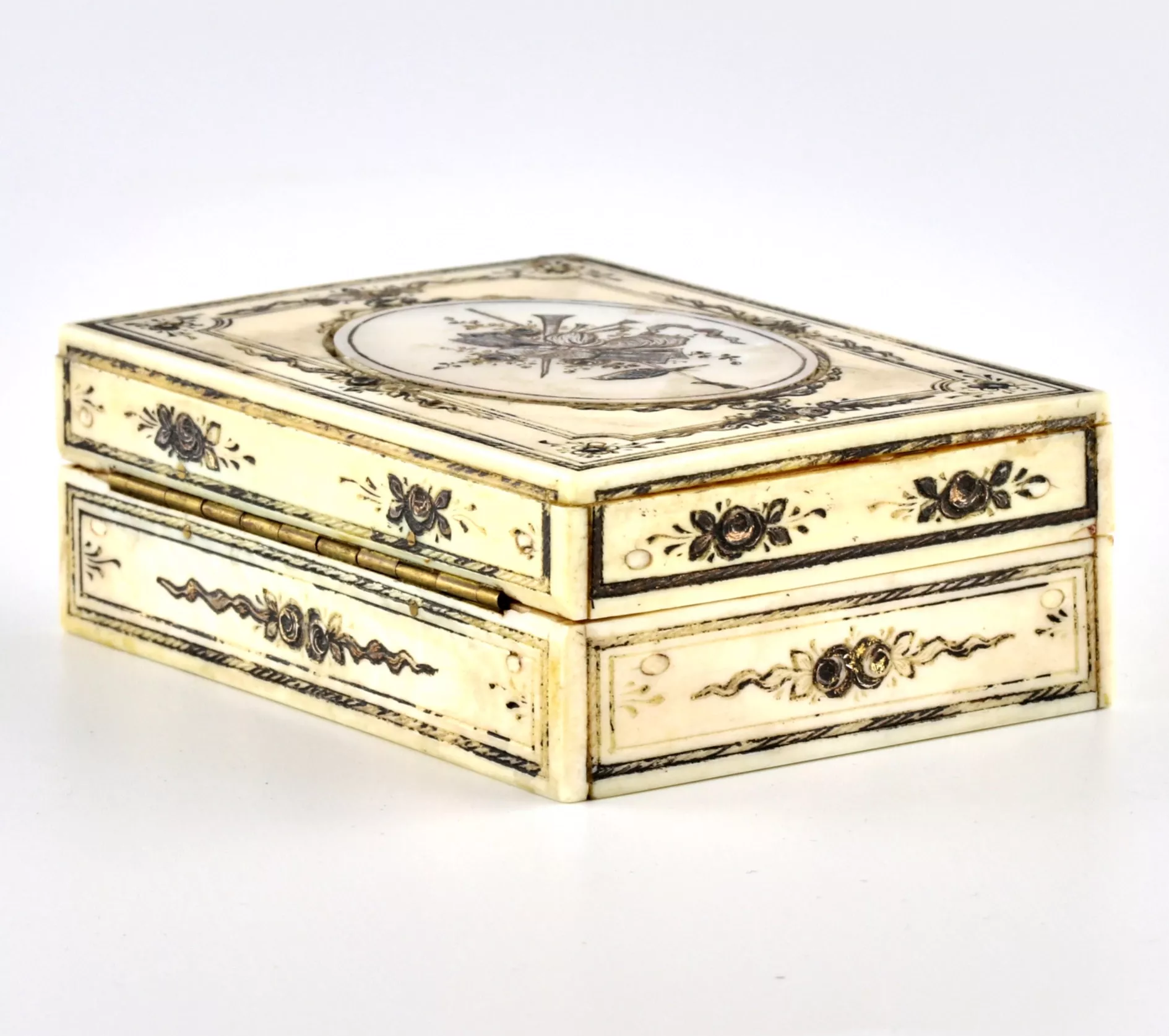 Ivory box with mother-of-pearl inlay. 