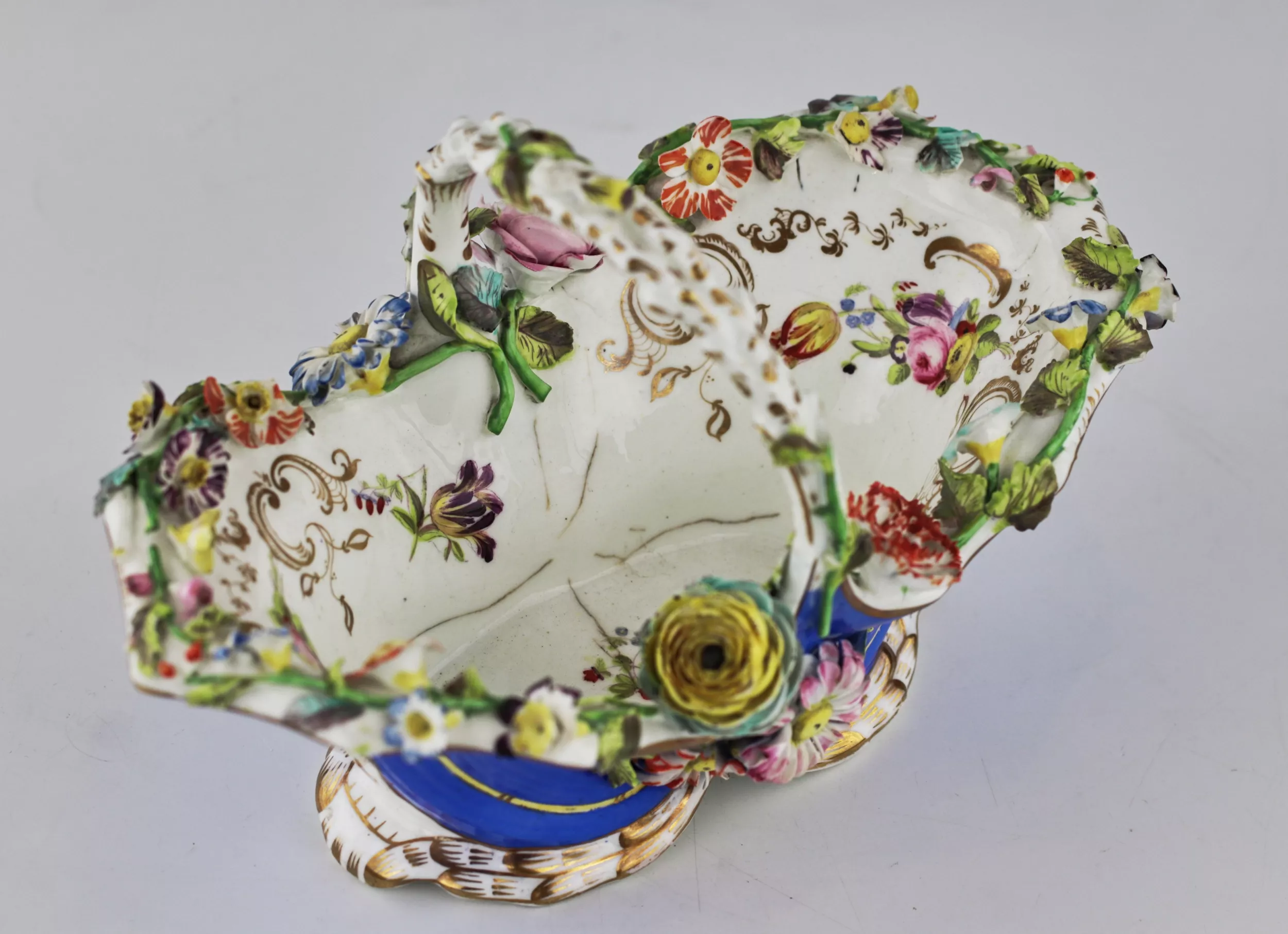 Porcelain basket with floral decor in Rococo style Europe, second half of the 19th century