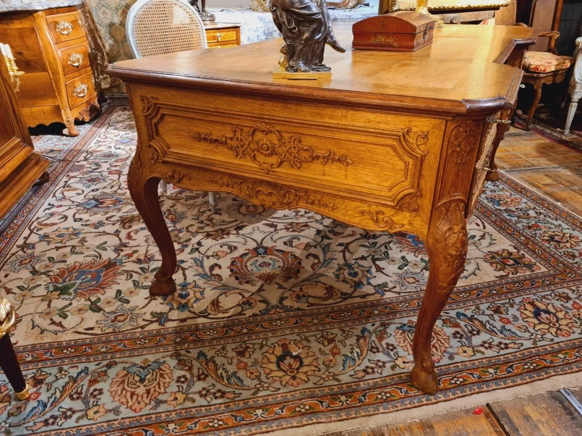 Regency style office table, richly carved. 