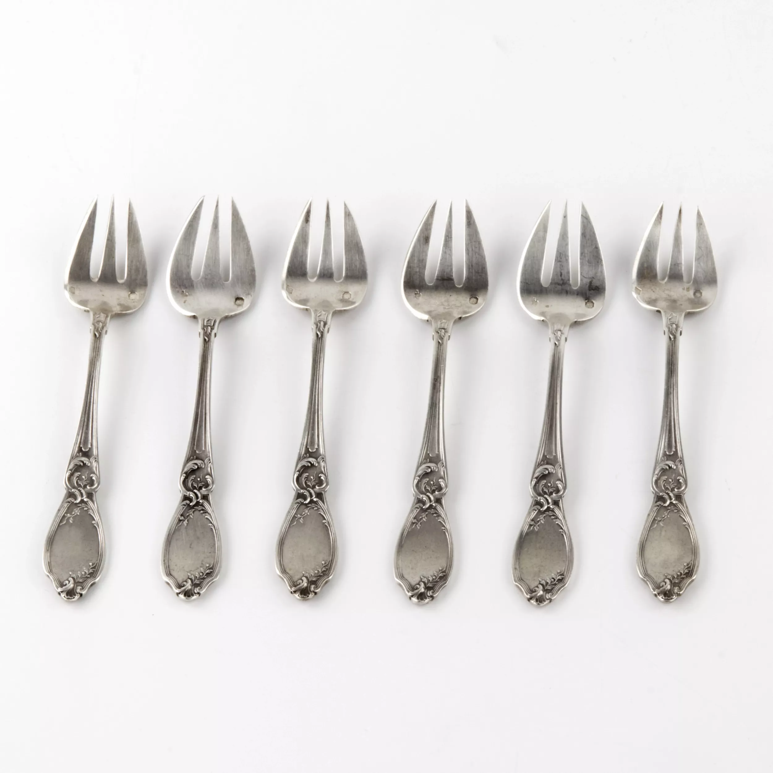 Set of six silver oyster forks. France. 