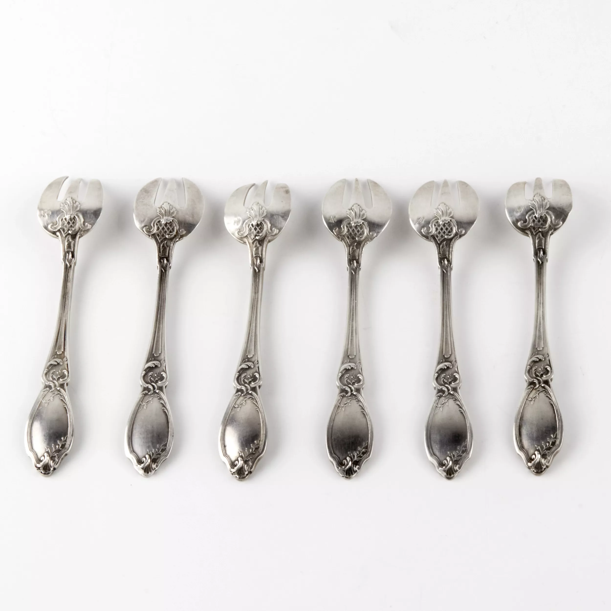 Set of six silver oyster forks. France. 