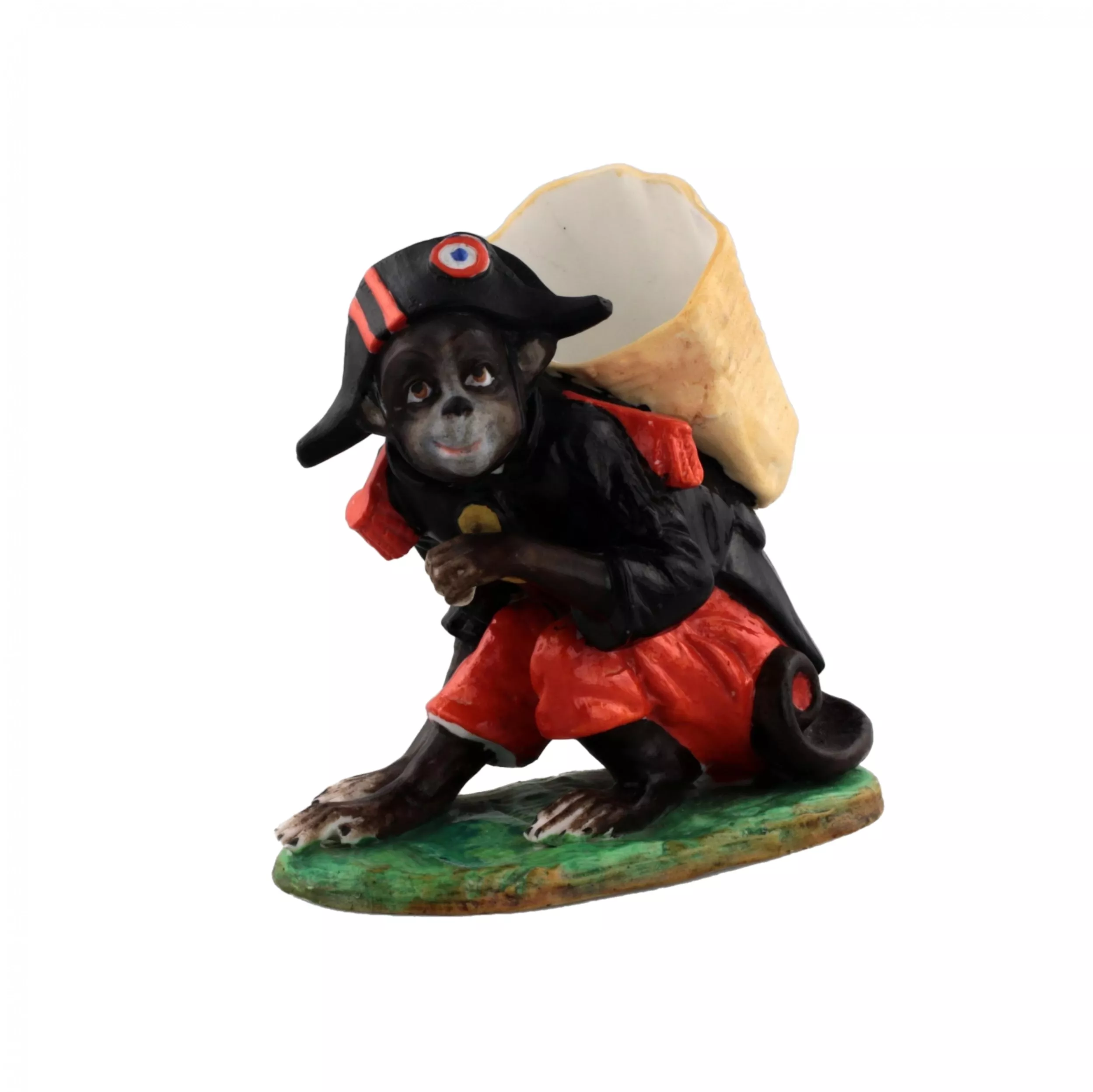 PORCELAIN FIGURE-CONTAINER MONKEY AS NAPOLEON. THURINGIA, GERMANY. LATE 19TH TO EARLY 20TH CENTURY.