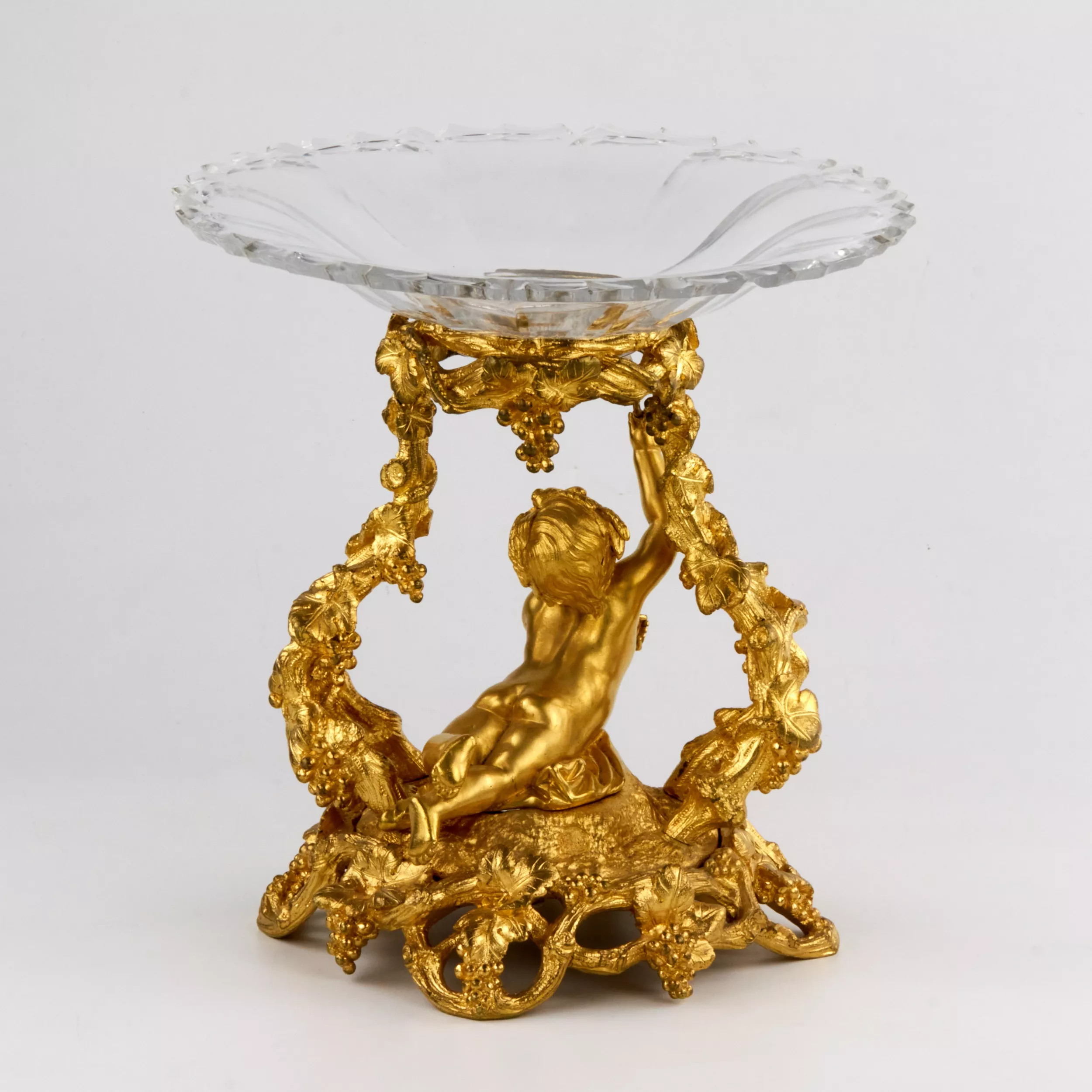 DECORATIVE GILT BRONZE AND CRYSTAL CENTREPIECE FRUIT BOWL IN THE NAPOLEON III STYLE. FRANCE, SECOND HALF OF THE 19TH CENTURY