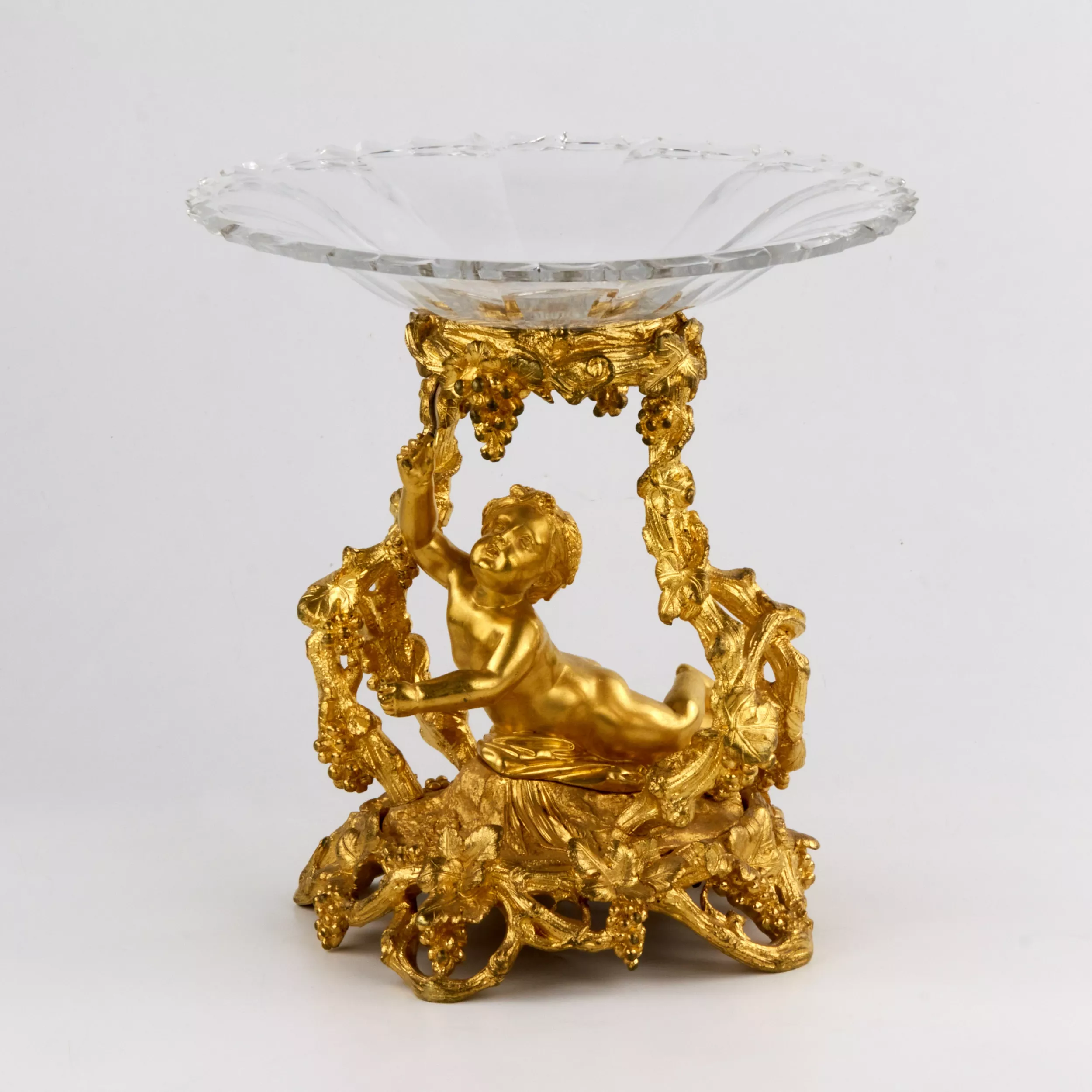 DECORATIVE GILT BRONZE AND CRYSTAL CENTREPIECE FRUIT BOWL IN THE NAPOLEON III STYLE. FRANCE, SECOND HALF OF THE 19TH CENTURY