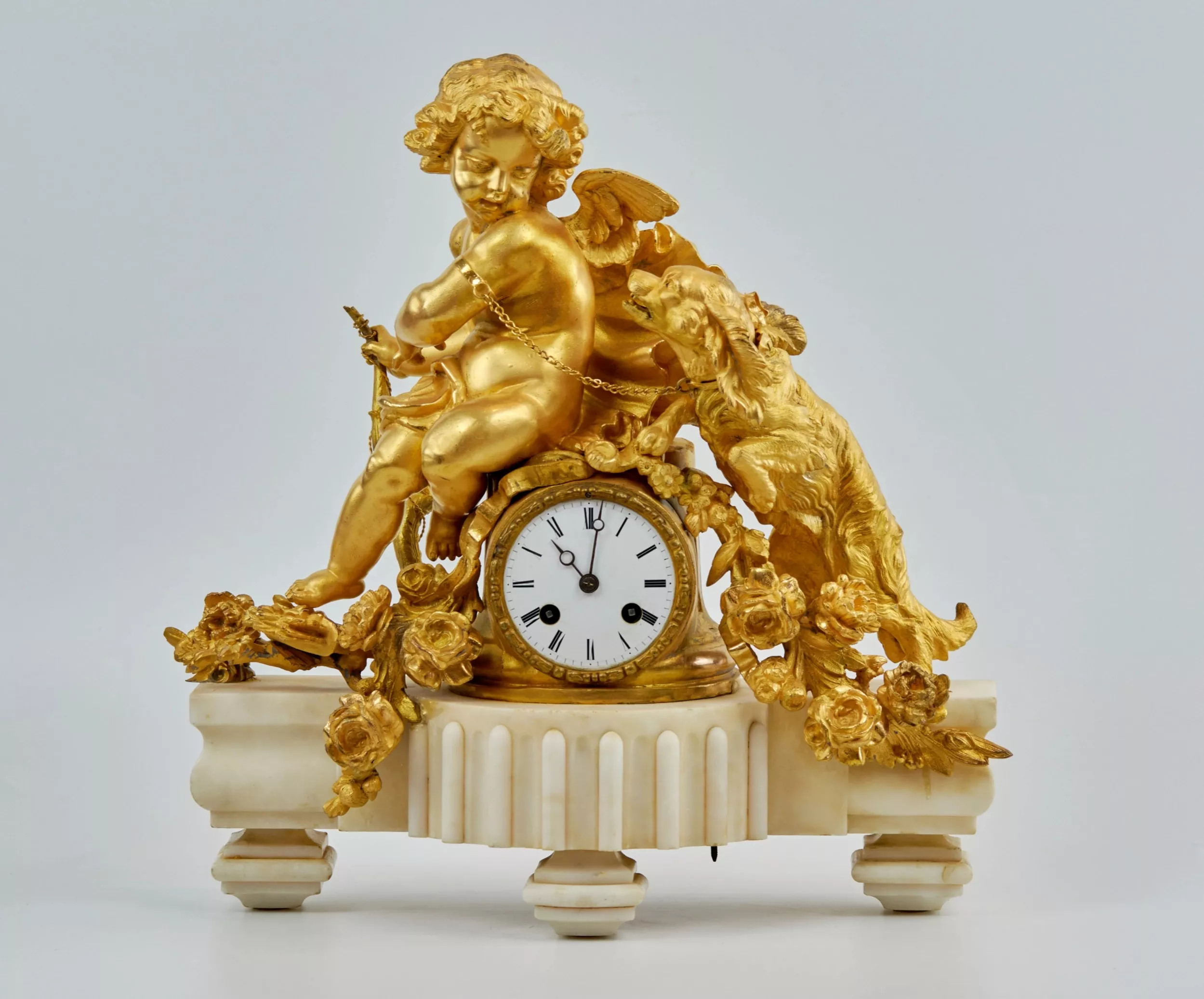 Philippe Mourey. Pendule Putti avec un chien. 