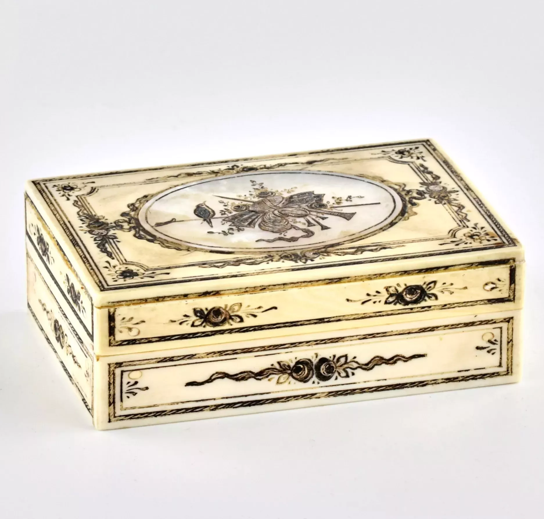 Ivory box with mother-of-pearl inlay. 