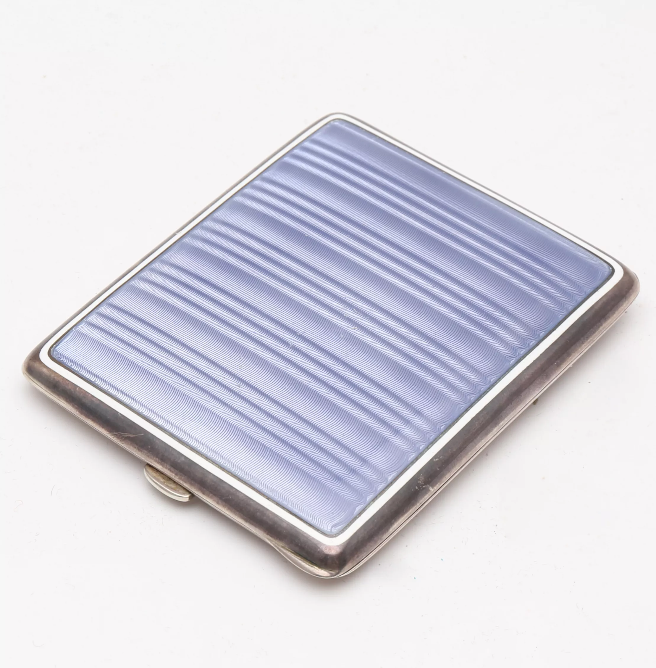 Silver cigarette case with guilloche enamel. 
