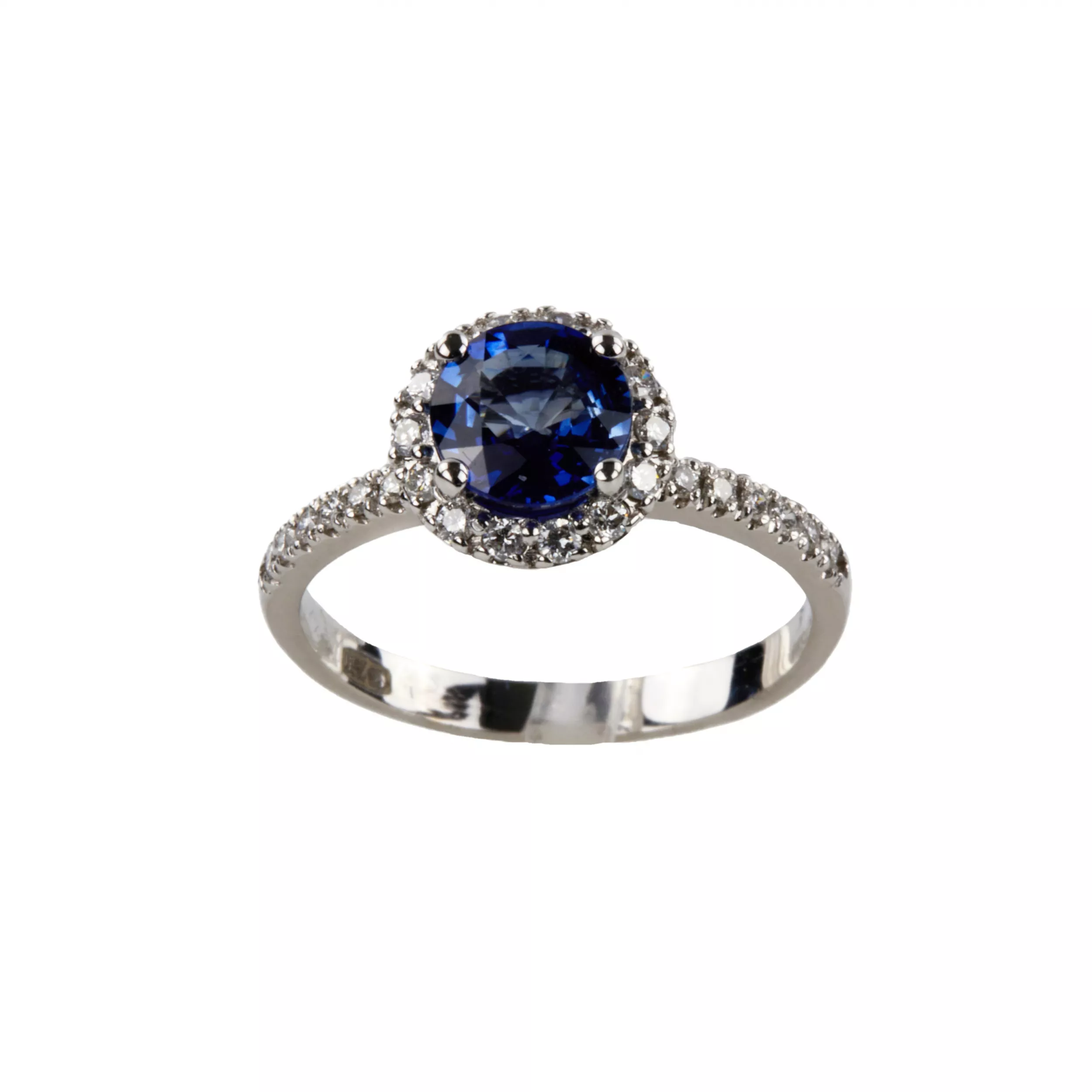 Bague en or blanc avec saphir bleu et diamants. 