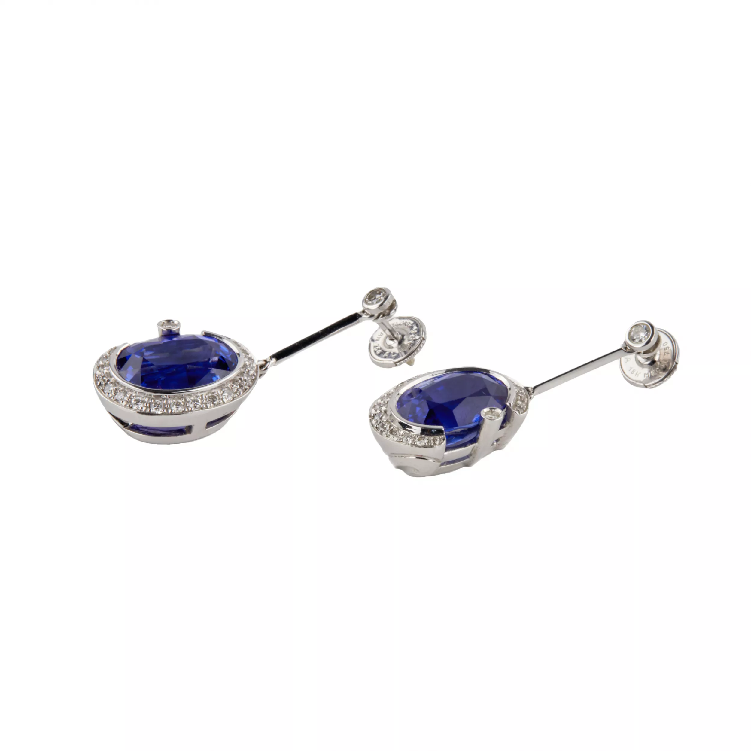 Boucles d`oreilles en or avec diamants et tanzanites. 