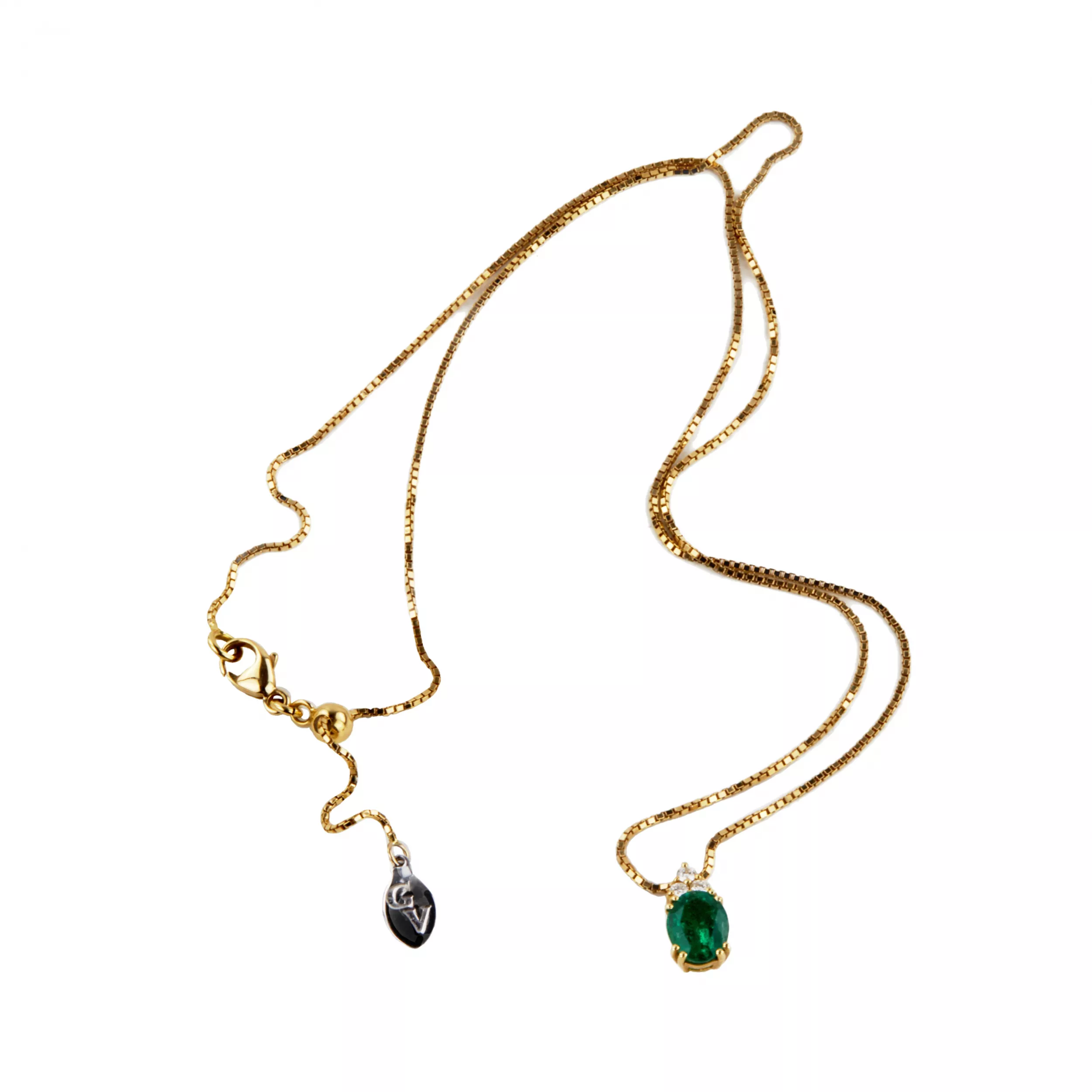 Giorgio Visconti. 18K gold pendant and earrings with emeralds and diamonds.