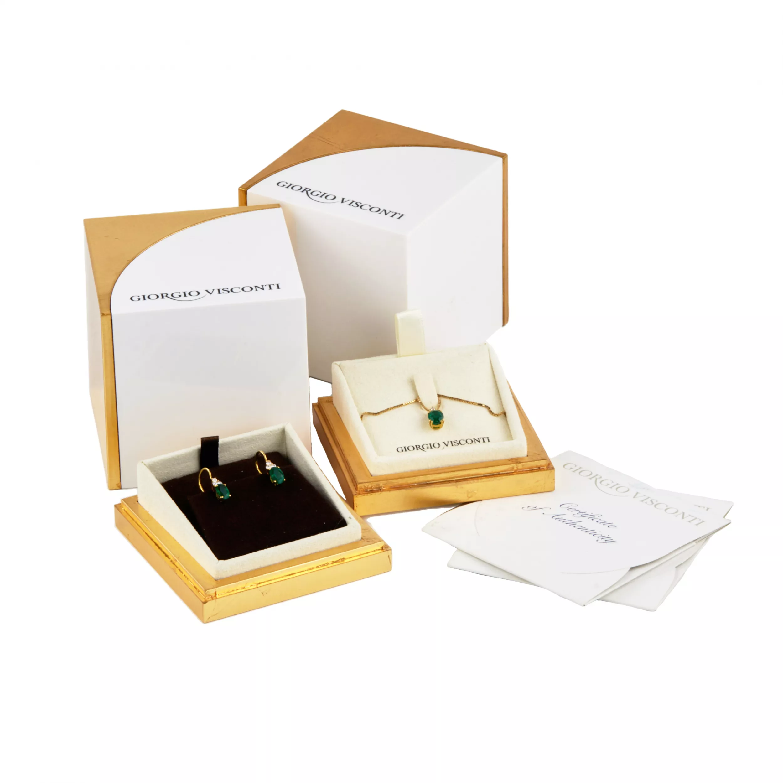 Giorgio Visconti. 18K gold pendant and earrings with emeralds and diamonds.