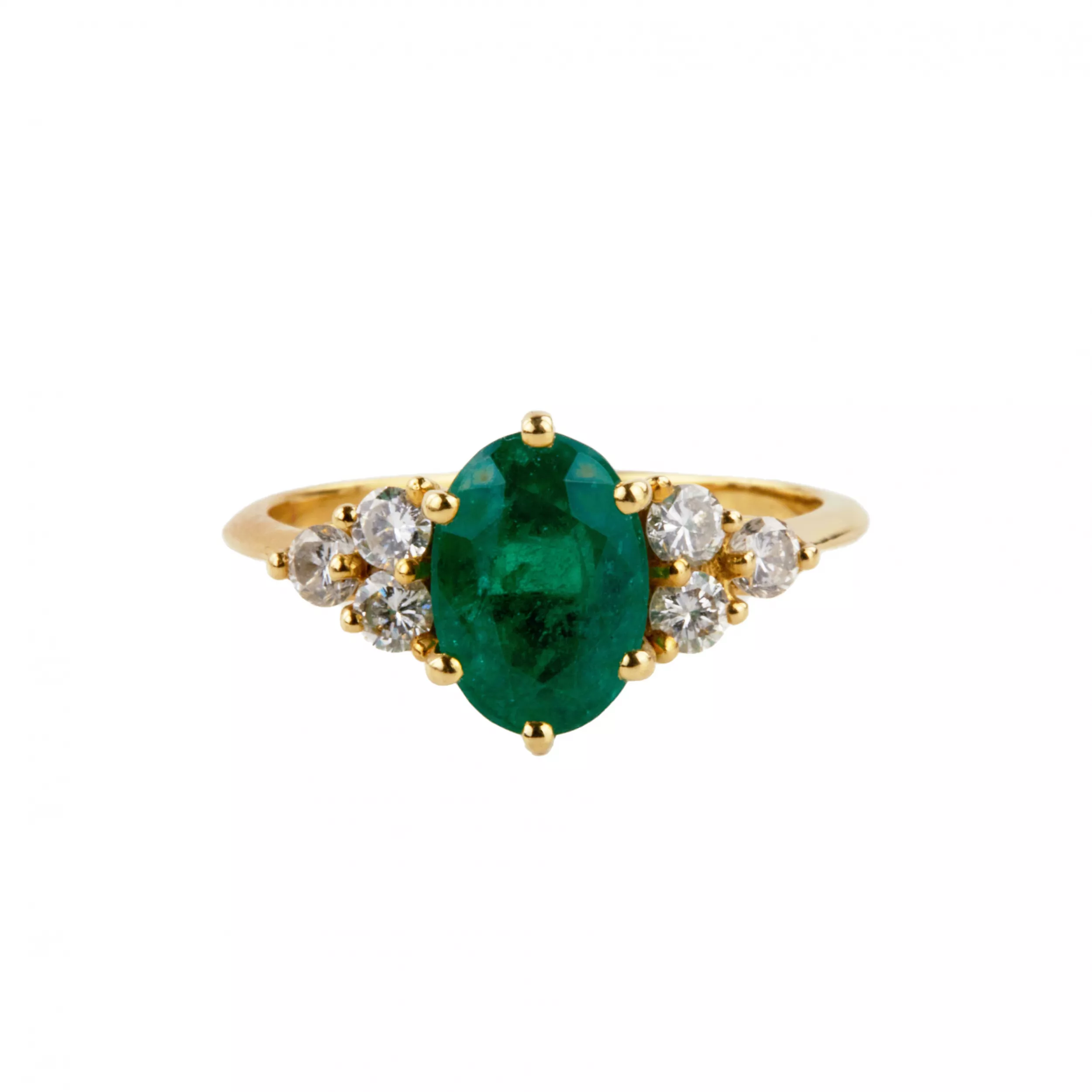 Gold ring with emerald and diamonds. 