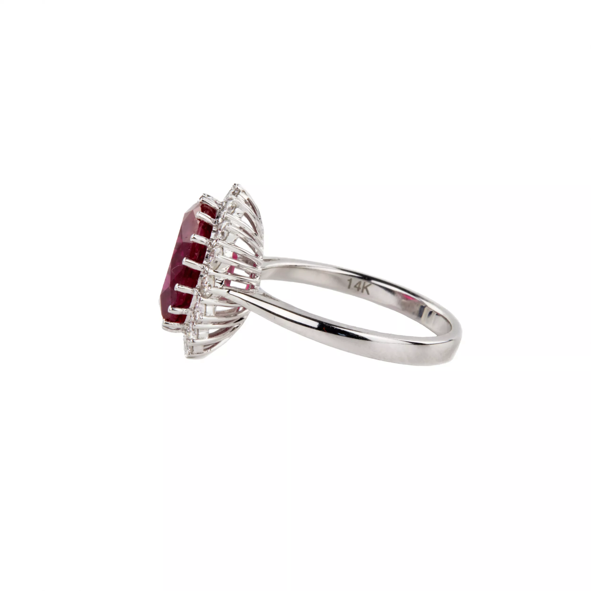 White gold ring with synthetic ruby and diamonds. 