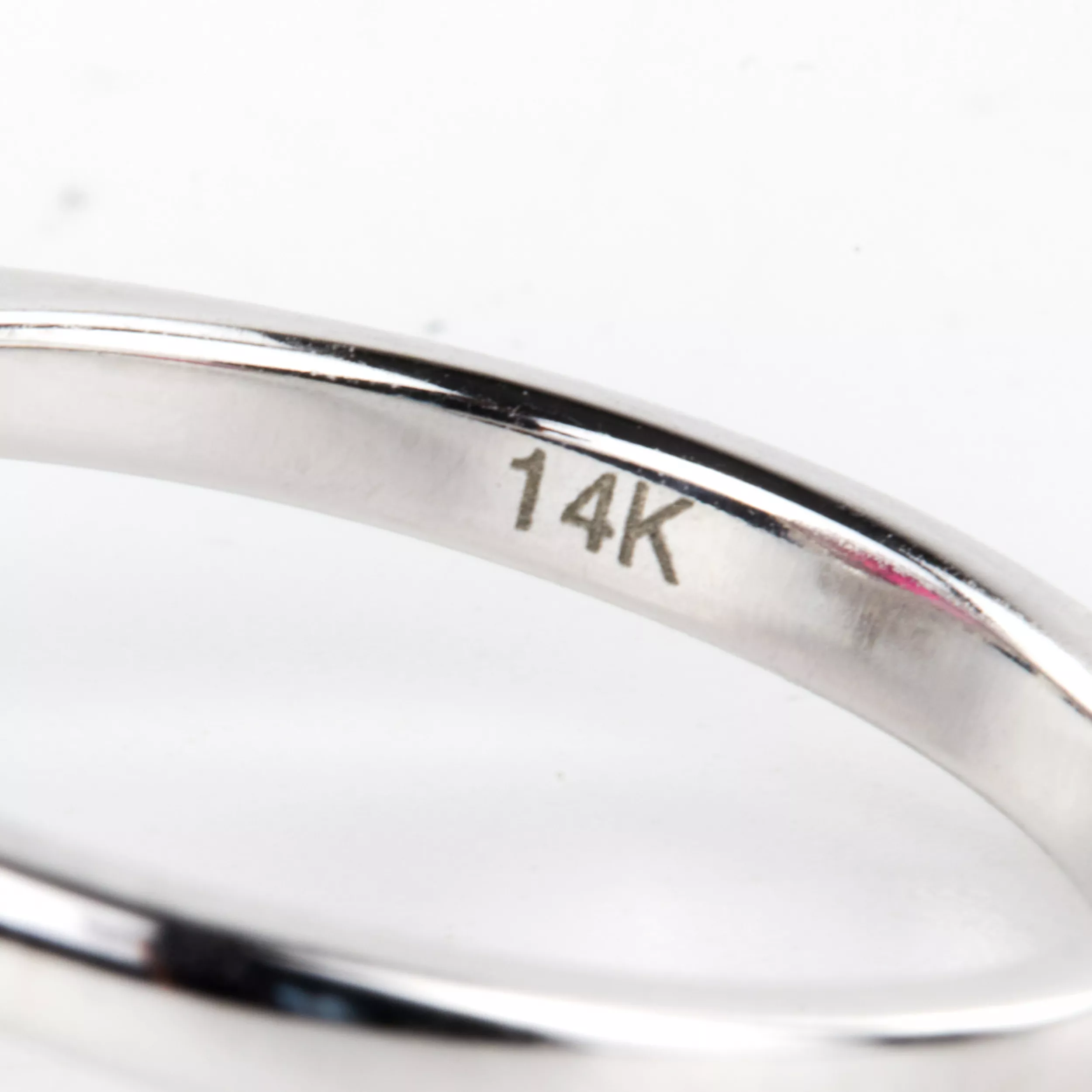 White gold ring with synthetic ruby and diamonds. 