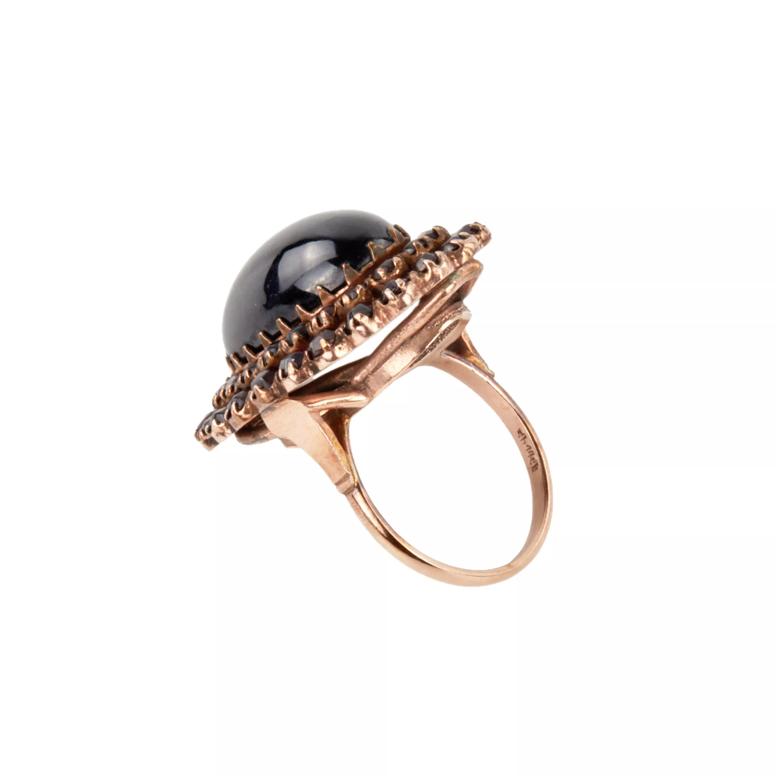 Golden ring with garnets. 