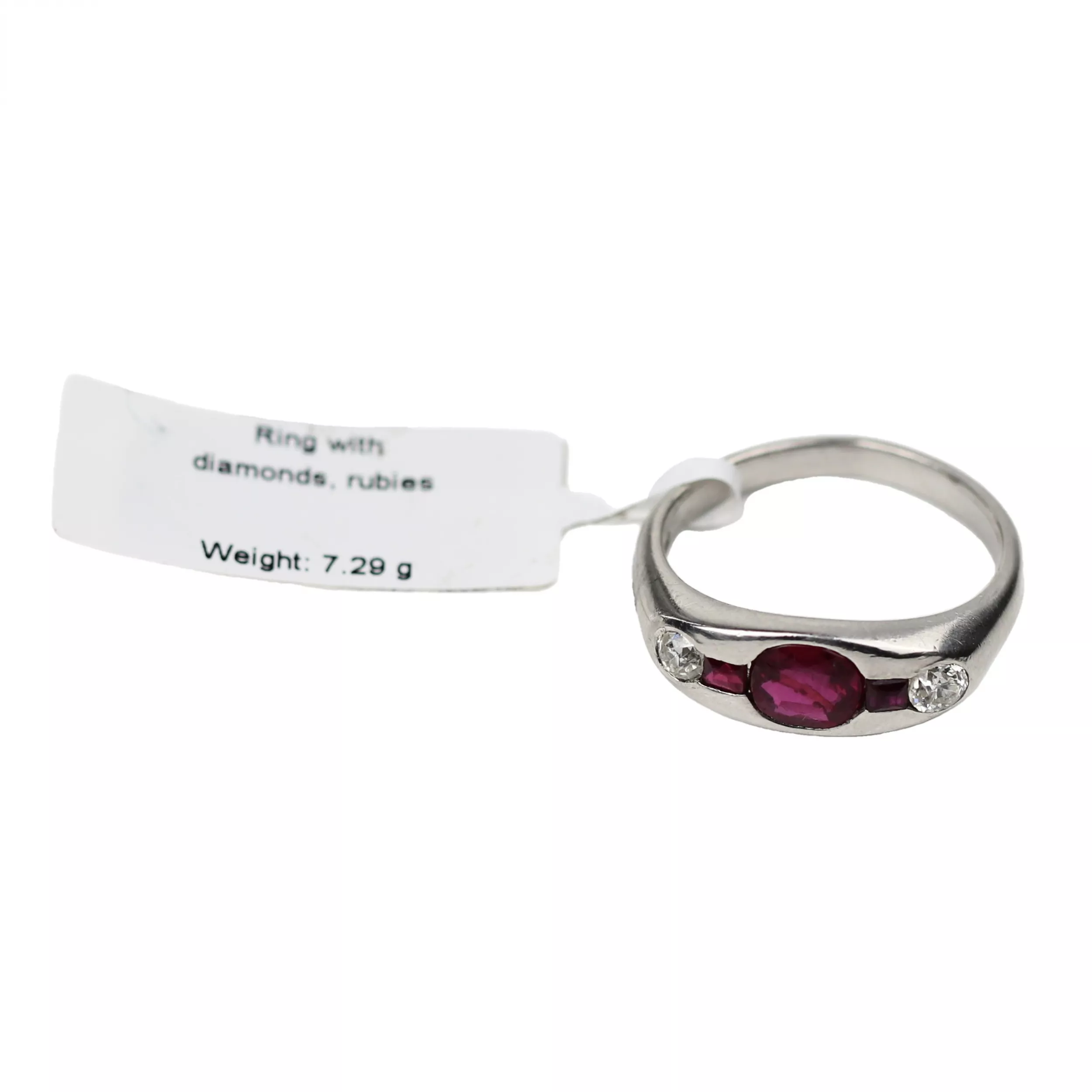 Gold ring with rubies and diamonds. 