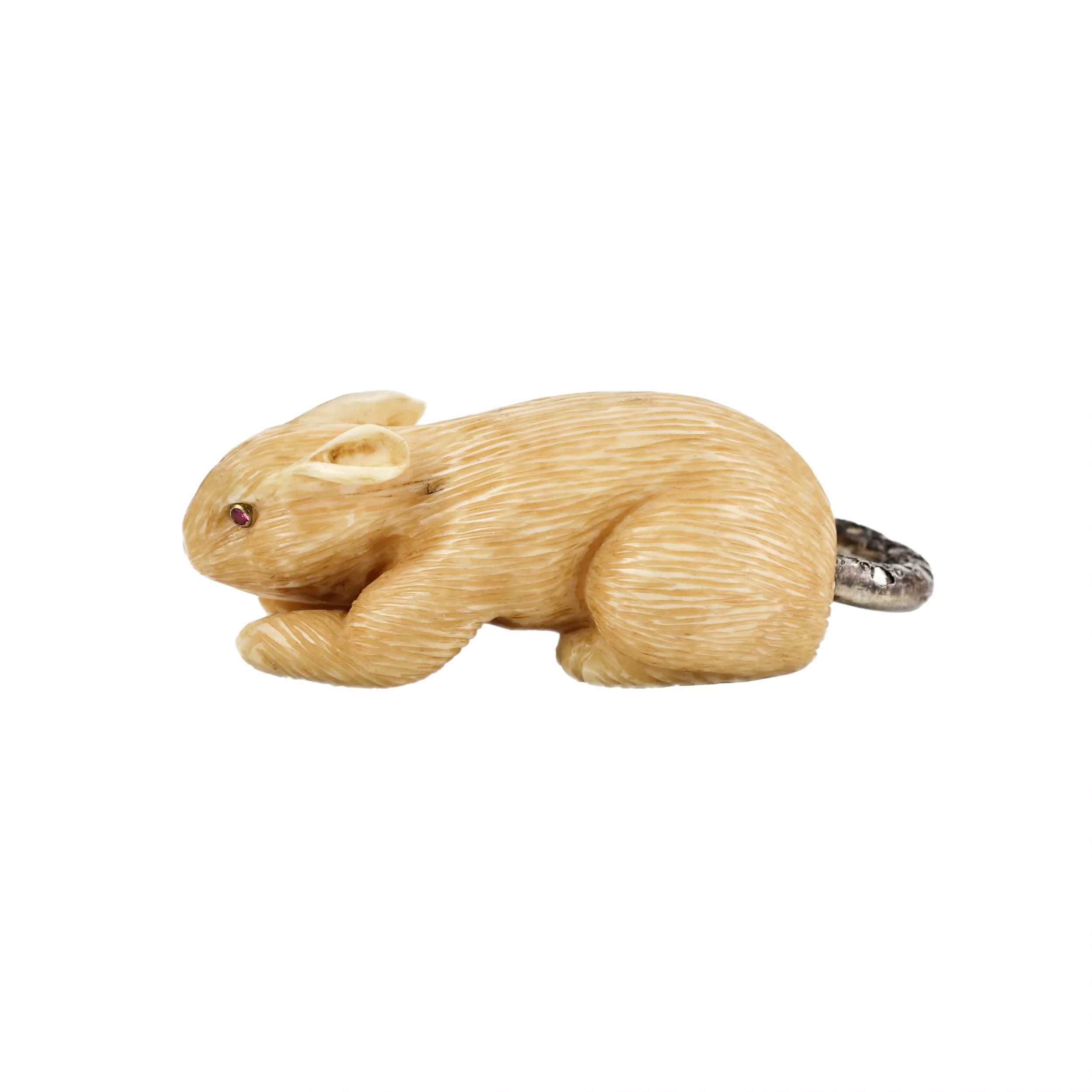 Souris de defense de mammouth sculptee avec queue de diamant. 