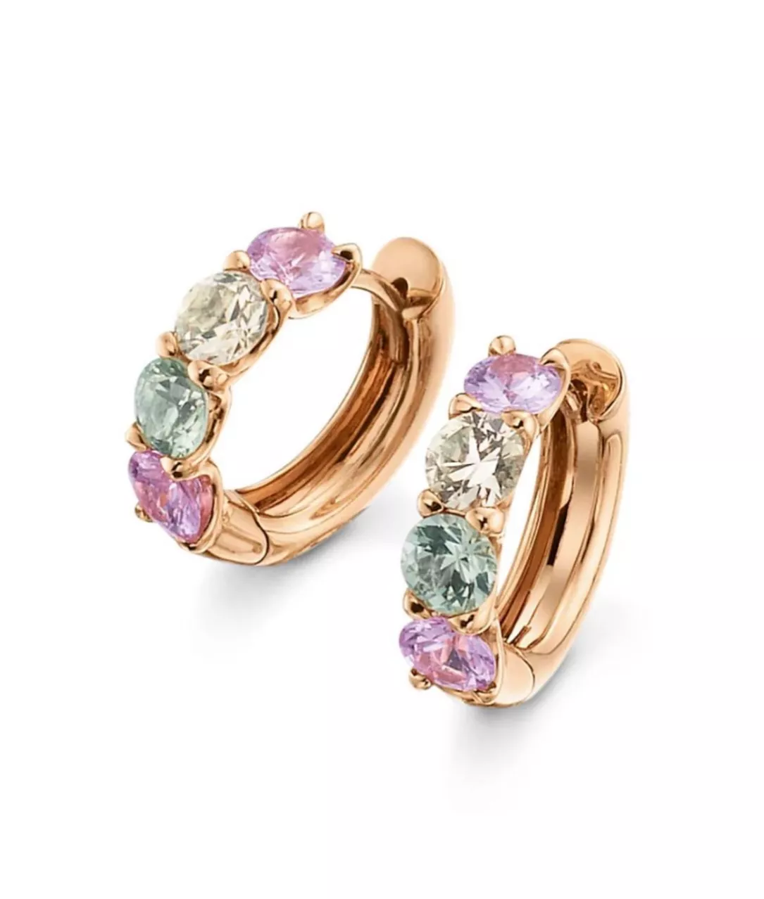 Earring and ring set in 18k rose gold with natural sapphires.