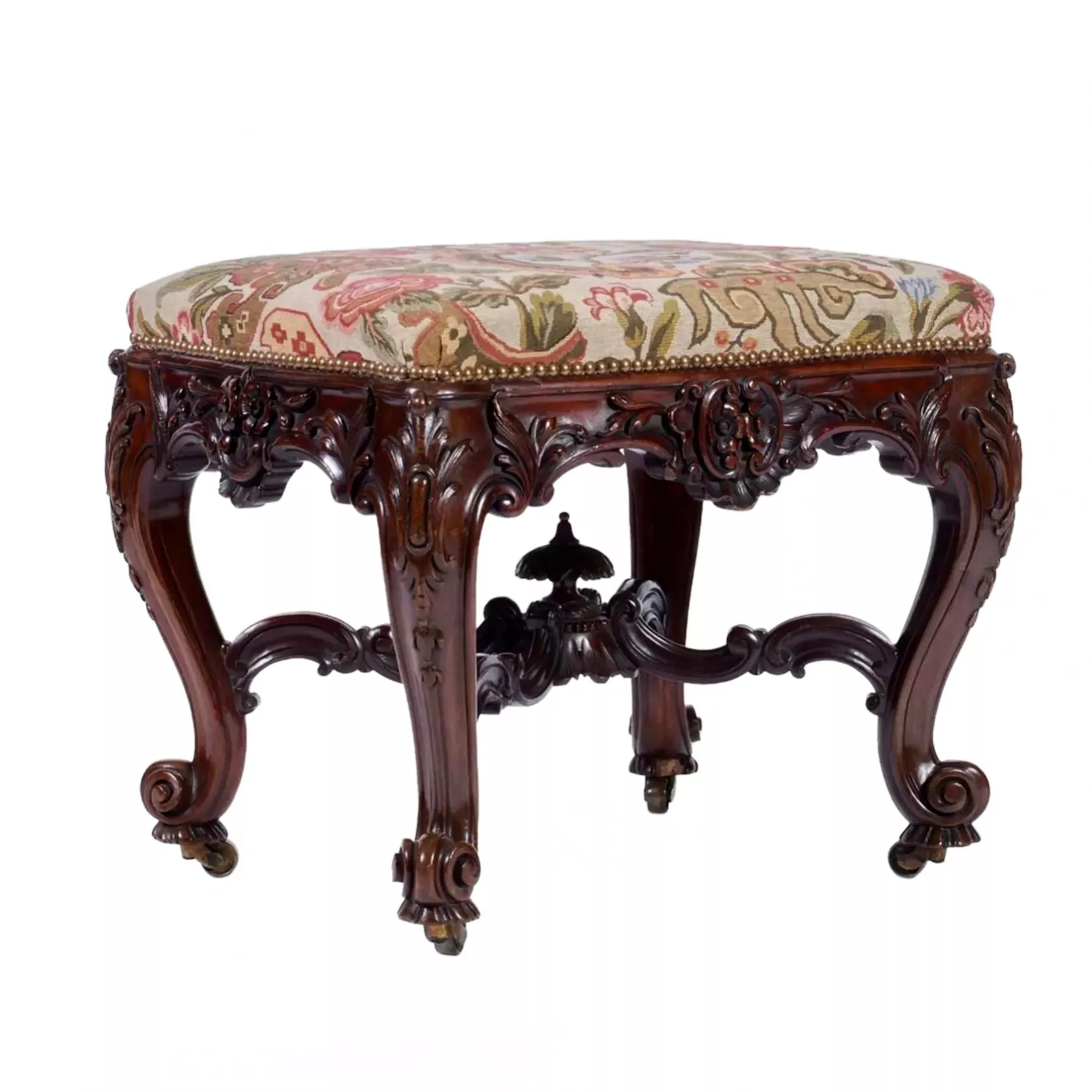 A pair of superb carved mahogany banquettes in the George II style. The turn of the 19th-20th centuries. 