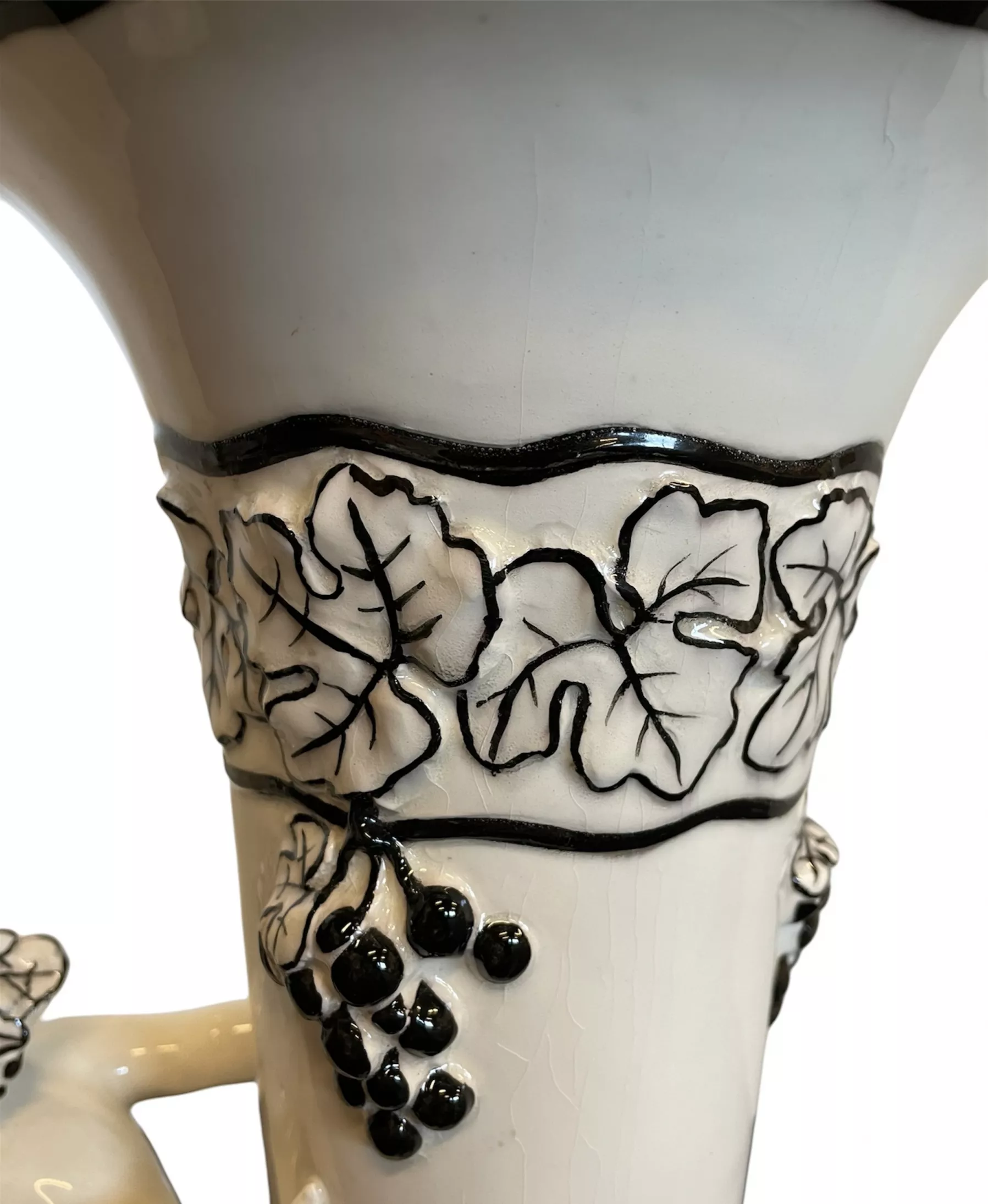  Carl Klimt - large vase with Putto and Grape Bunches. Designed circa 1915, probably by Bernhard Bloch, Eichwald ceramics. Off-white body decorated in black. (Teplitz 1876-1945 Zinnwald), start of the 20th century.