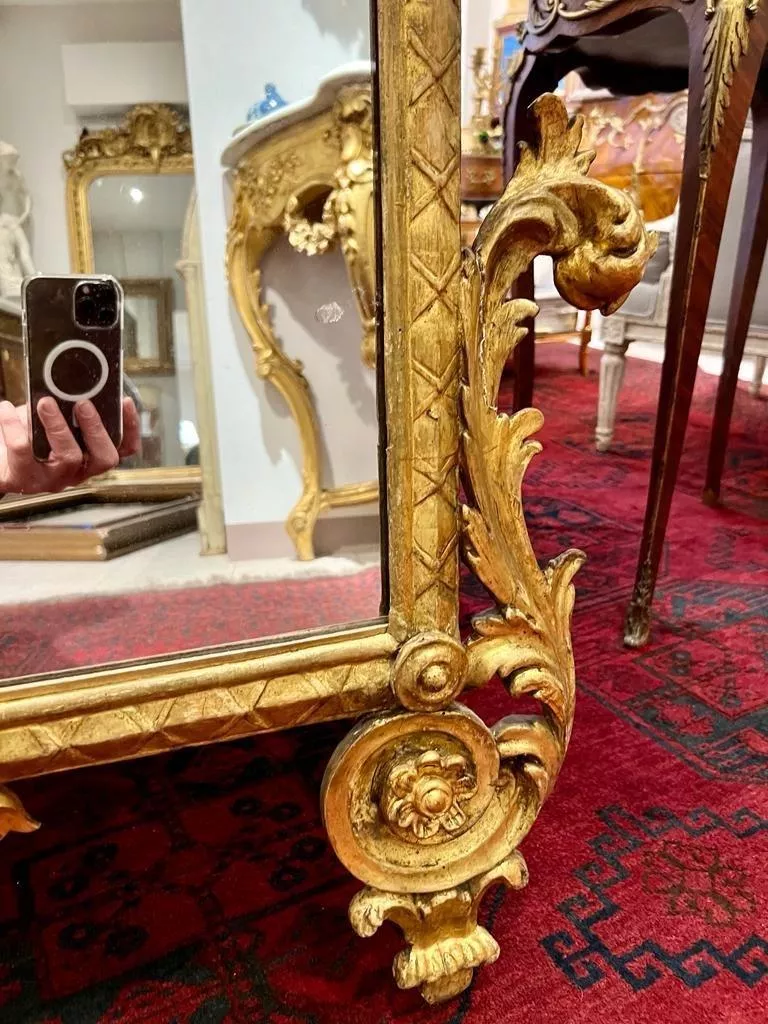 Rare 18th century gilded wood mirror, Italy