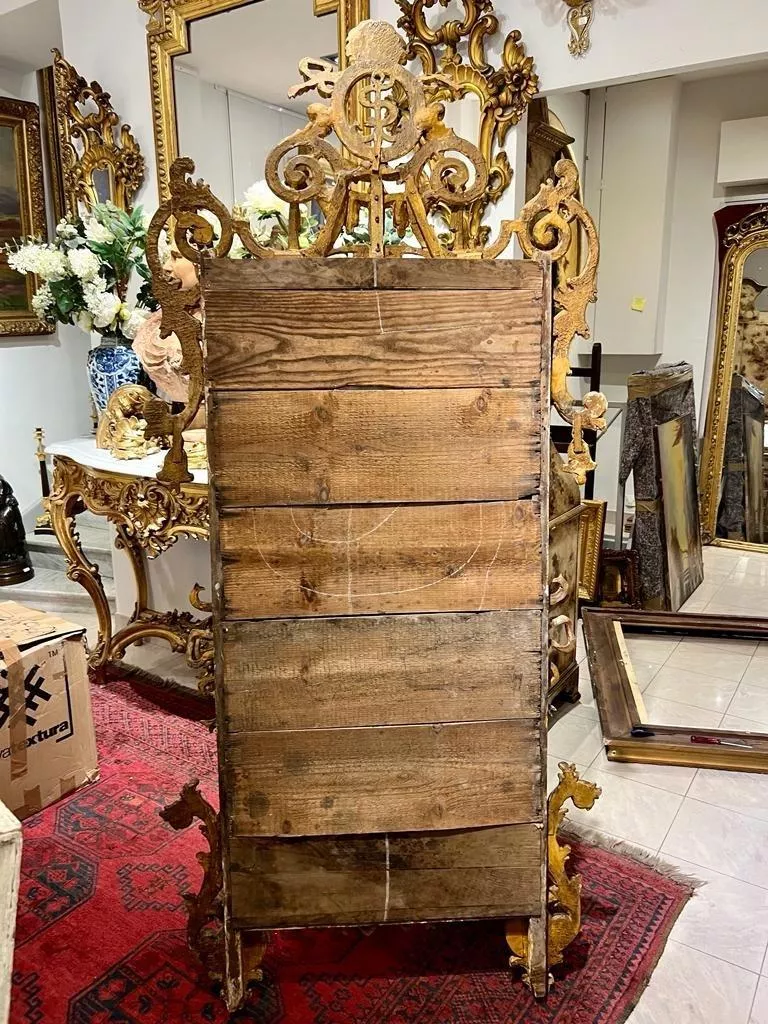 Rare 18th century gilded wood mirror, Italy
