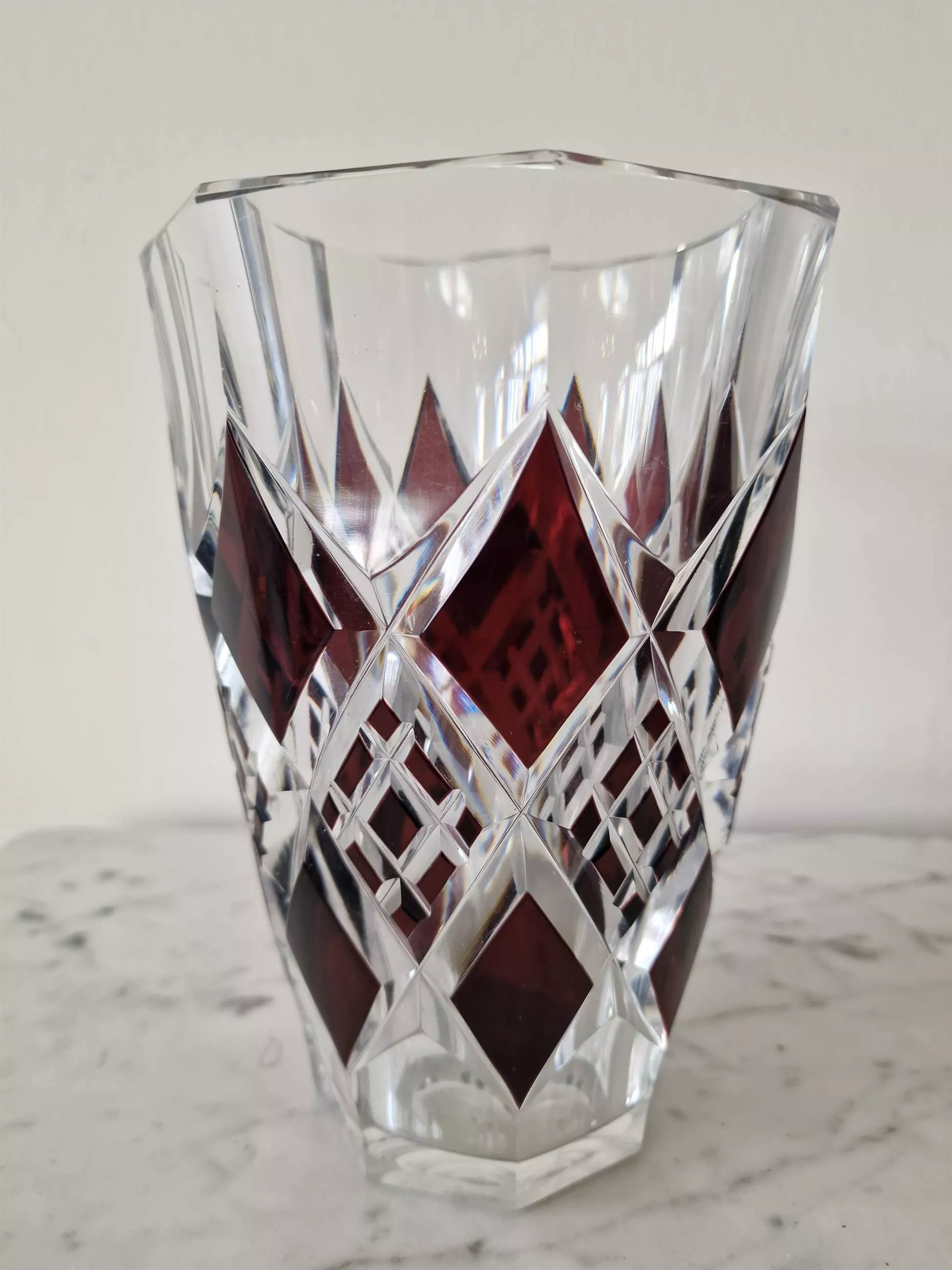 Bohemian crystal vase with bronze puti