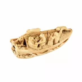 Netsuke en ivoire. Bateau singe. 
