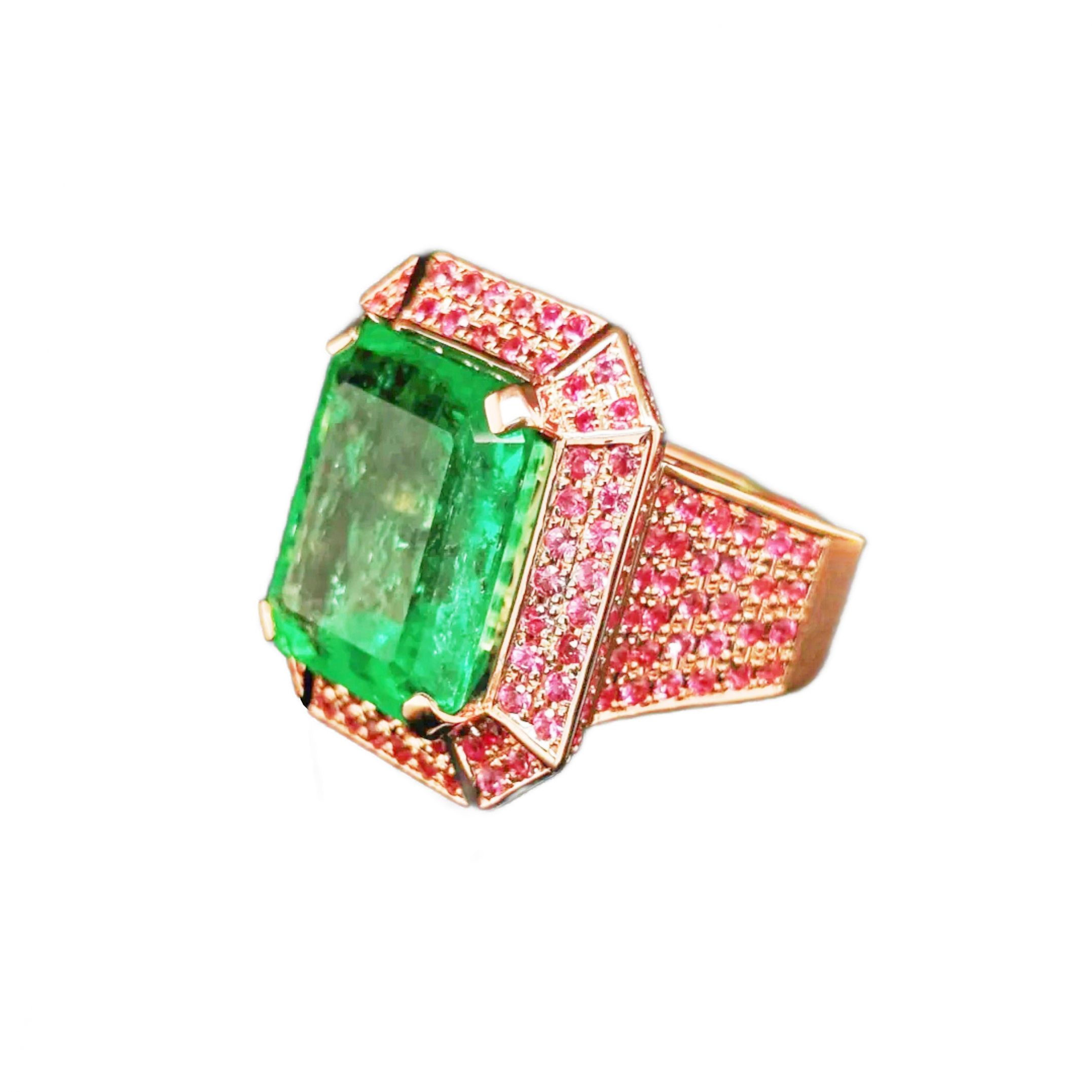12.30 ct Colombian emerald ring with 2.15ct pink sapphires in 18k gold.