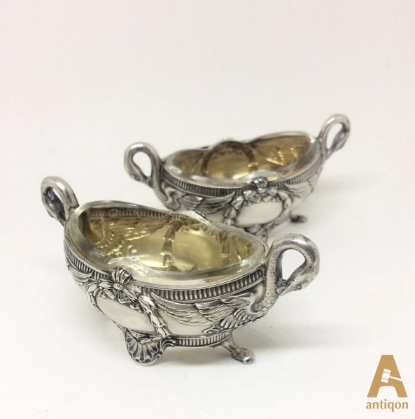 A-pair-of-Empire-style-silver-saltcellars-Swans