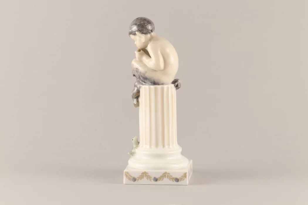 Figurine "Faun playing on a column". Royal Copenhagen