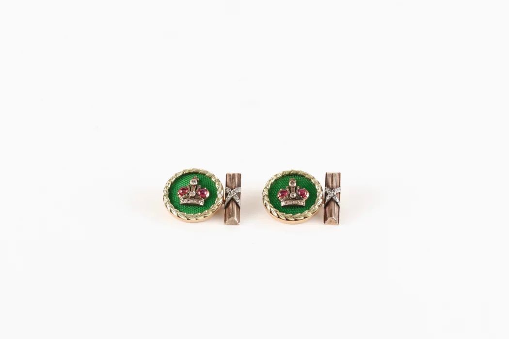 A pair of gold cufflinks