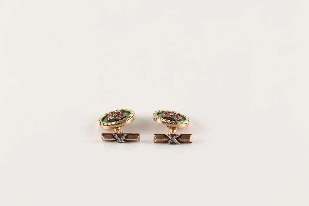 A pair of gold cufflinks