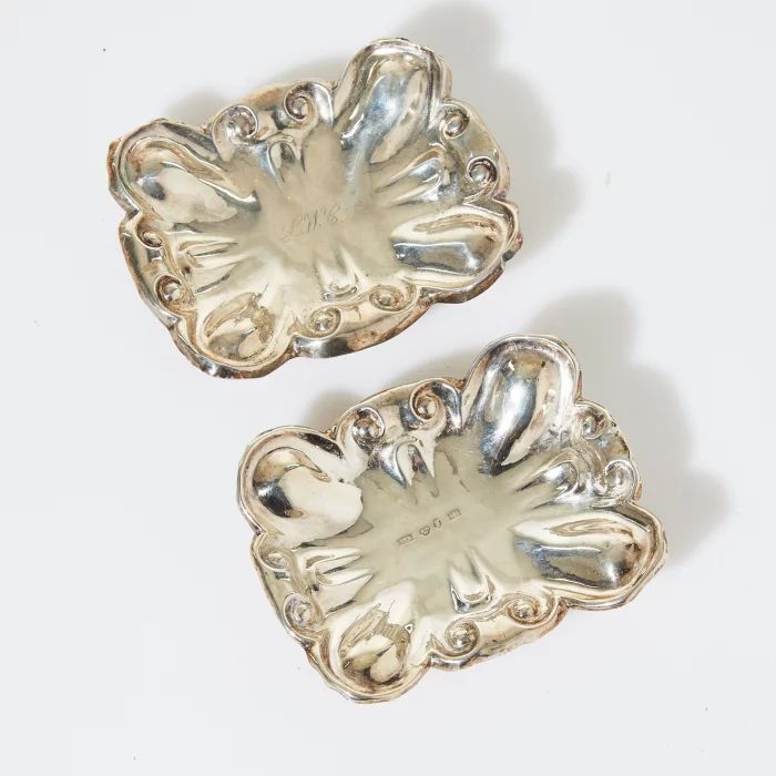 A pair of silver saltcellars.