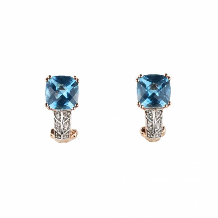 14K gold earrings with topaz and diamonds in original box. 