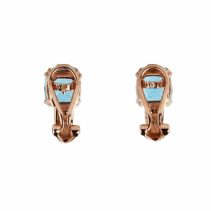 14K gold earrings with topaz and diamonds in original box. 