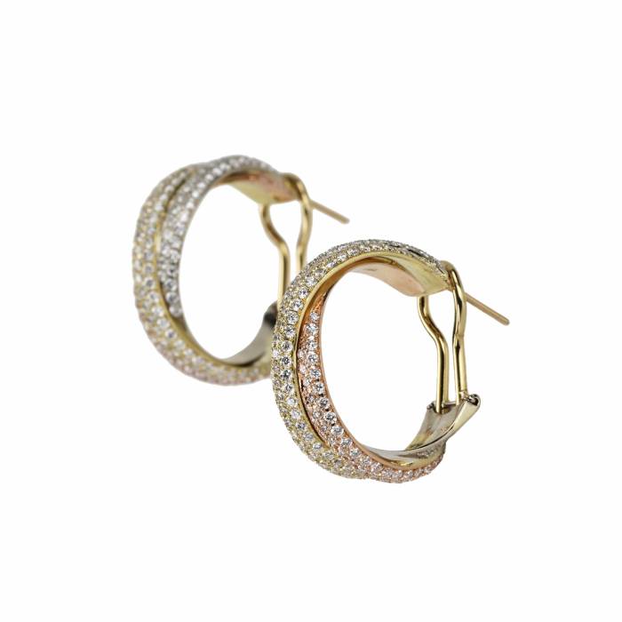 Cartier earrings in tricolor yellow gold with diamonds. 